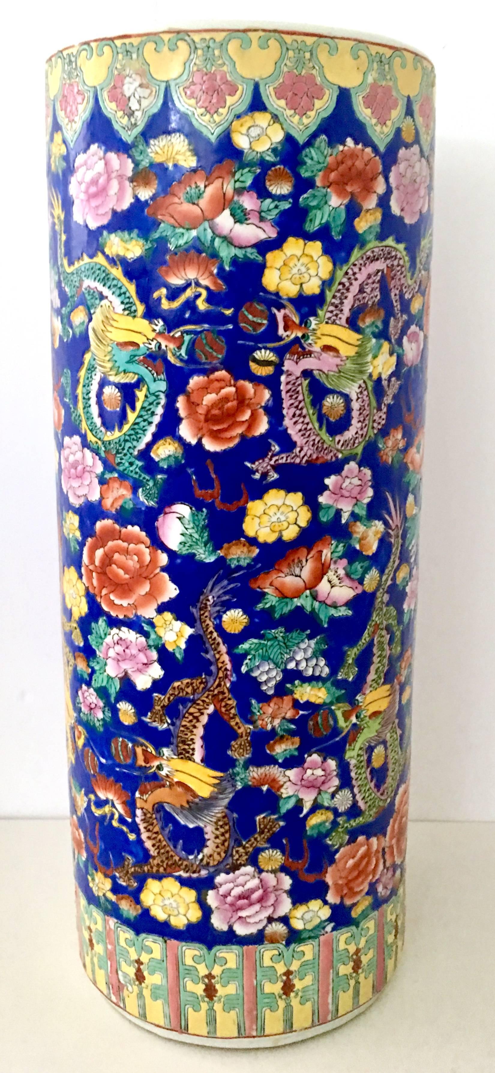 Mid-Century Chinese export porcelain hand-painted Famille Dragon Umbrella Stand or Tall Vase. This vibrant cobalt blue ground hand painted 'dragon