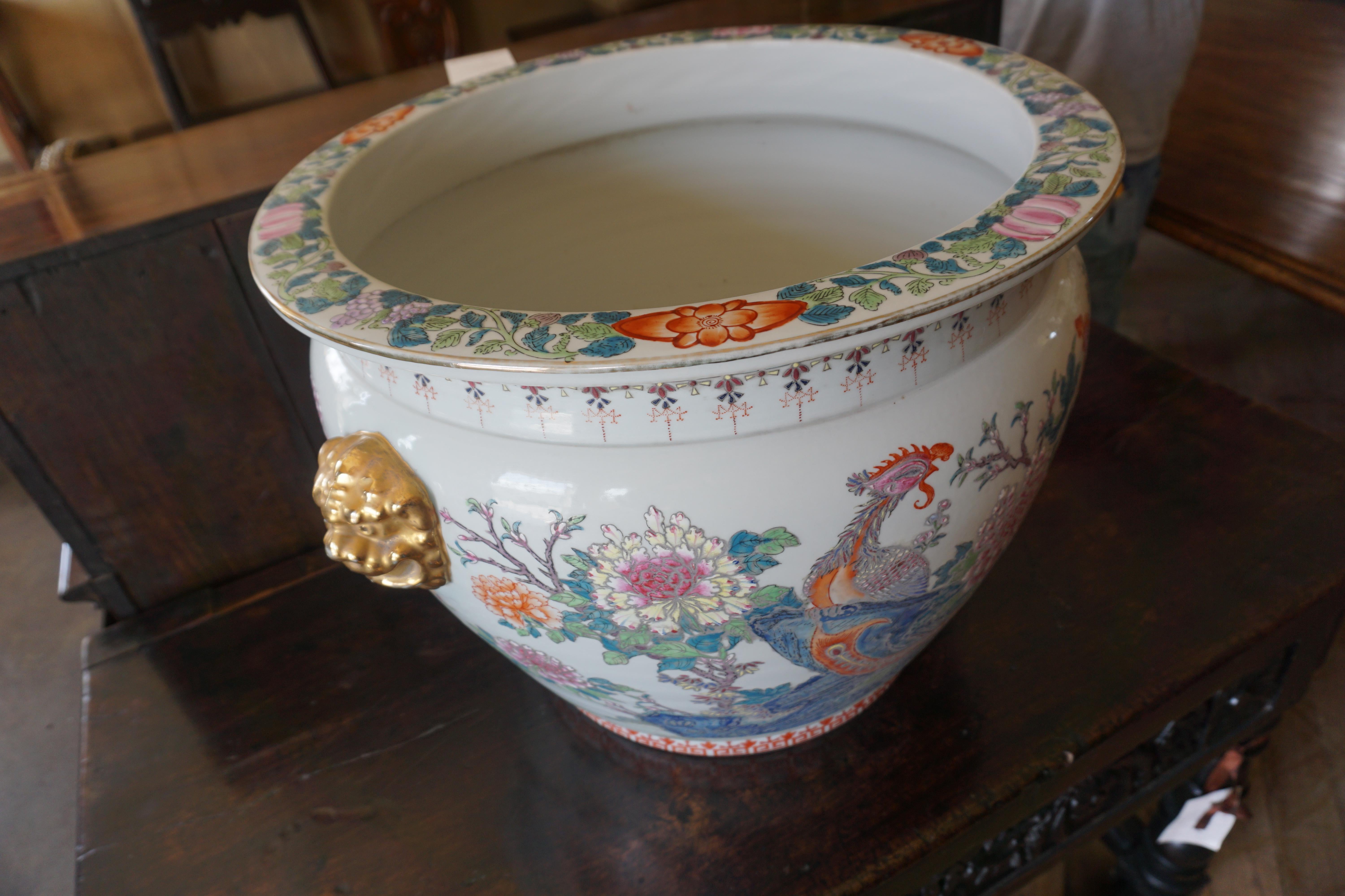 Chinese 20th century hand painted and fully glazed Chinese porcelain fishbowl planter, in excellent condition. 

Measurements: 16'' H x 20'' W.