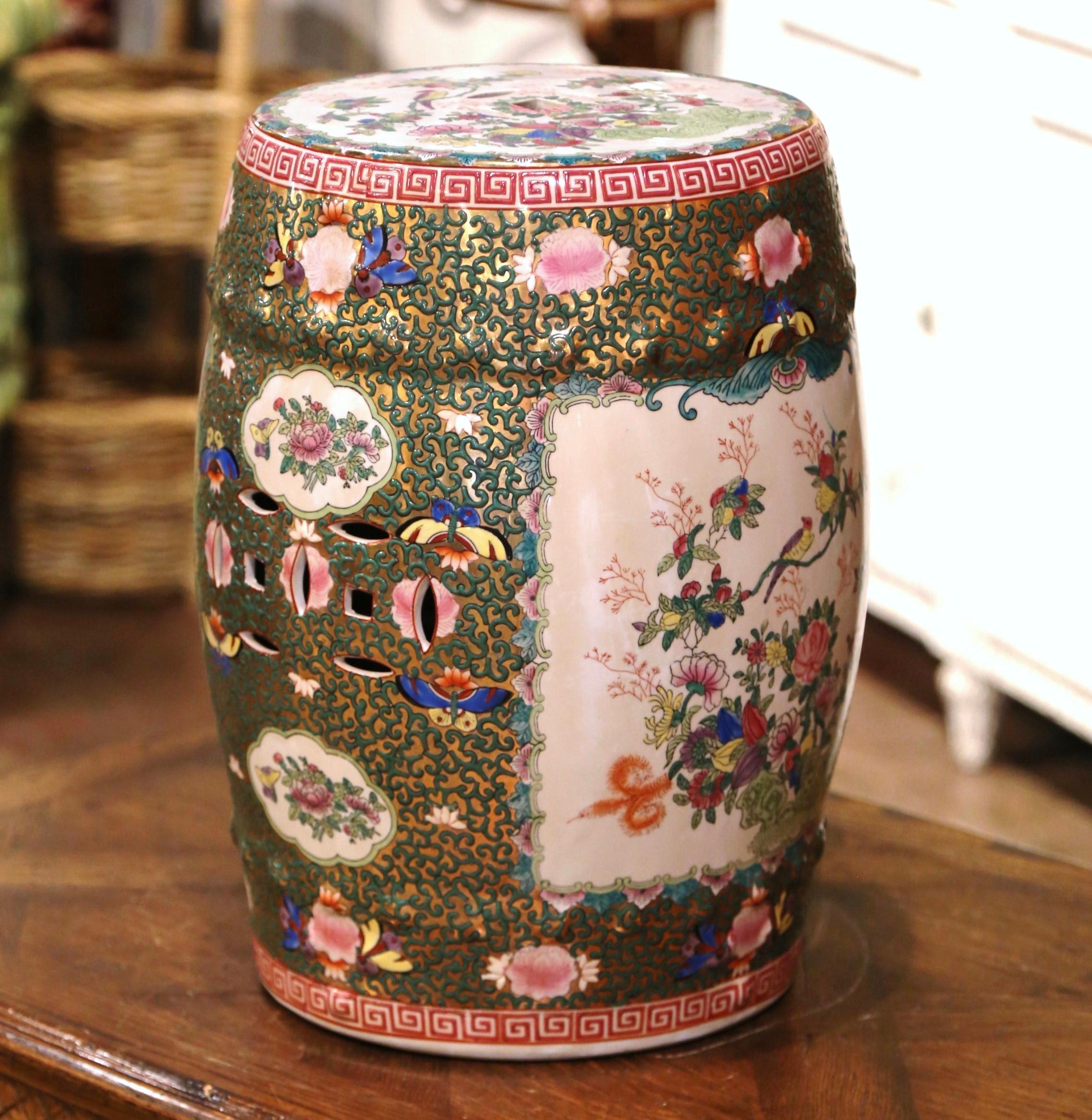 Decorate a den or a living room with this colorful vintage garden stool. Created in China, circa 1950 and round in shape, the porcelain seat is pierced on the top and around the perimeter for an intricate, sculptural effect. The exotic Asian stool