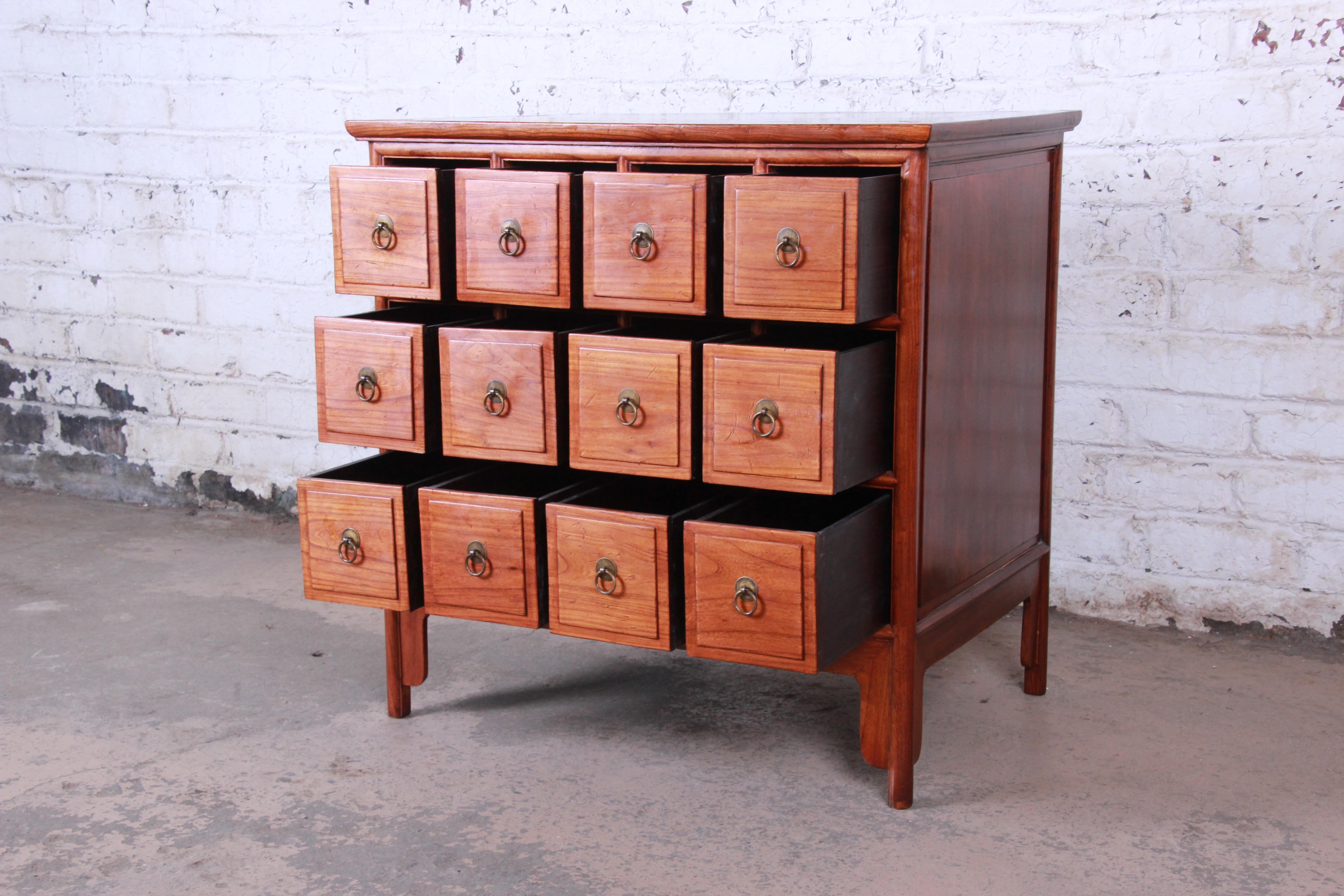 Brass Midcentury Chinese Twelve-Drawer Elm Wood Apothecary Cabinet