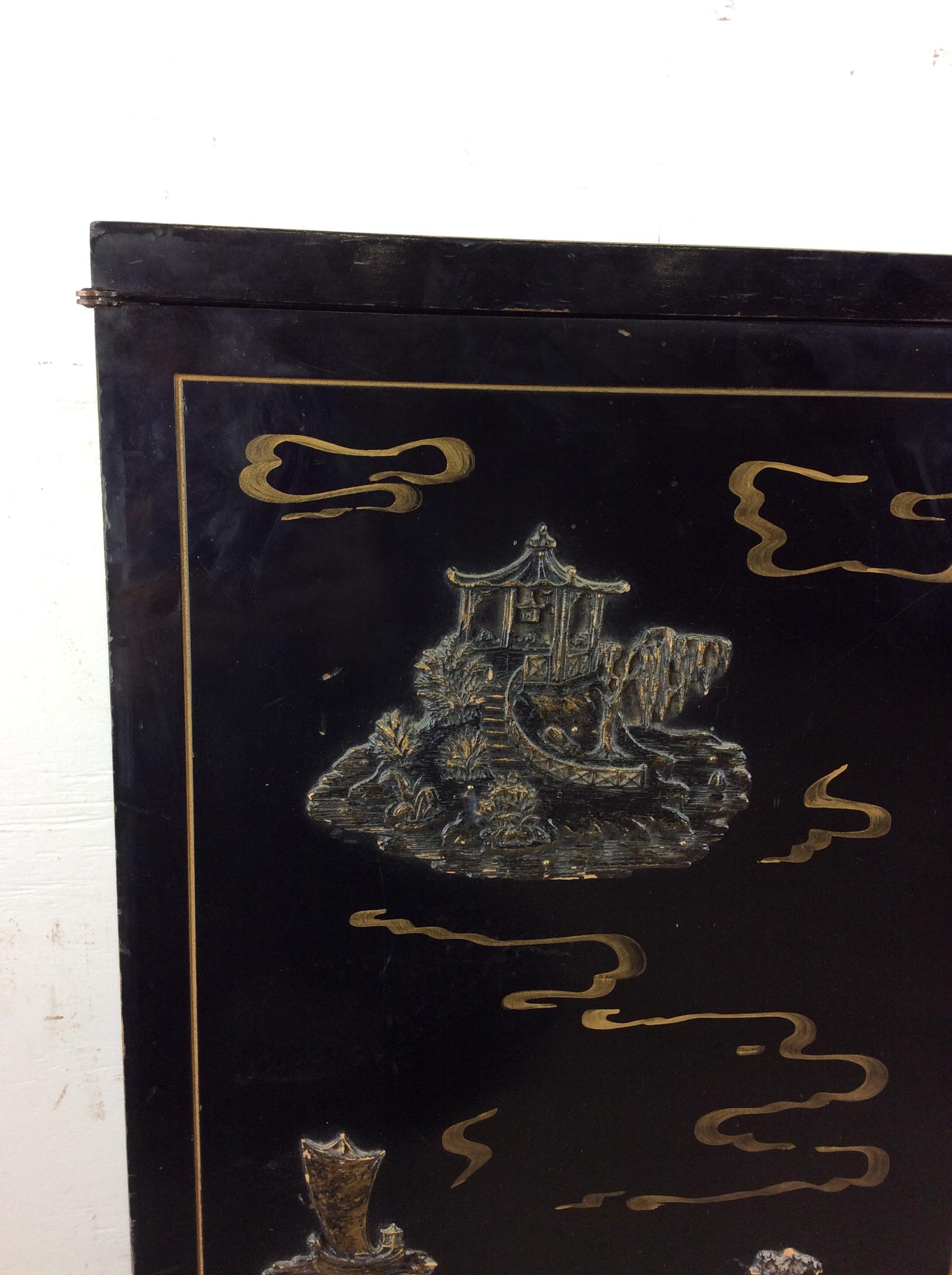 20th Century Mid century chinoiserie black lacquer cabinet with 8 drawers