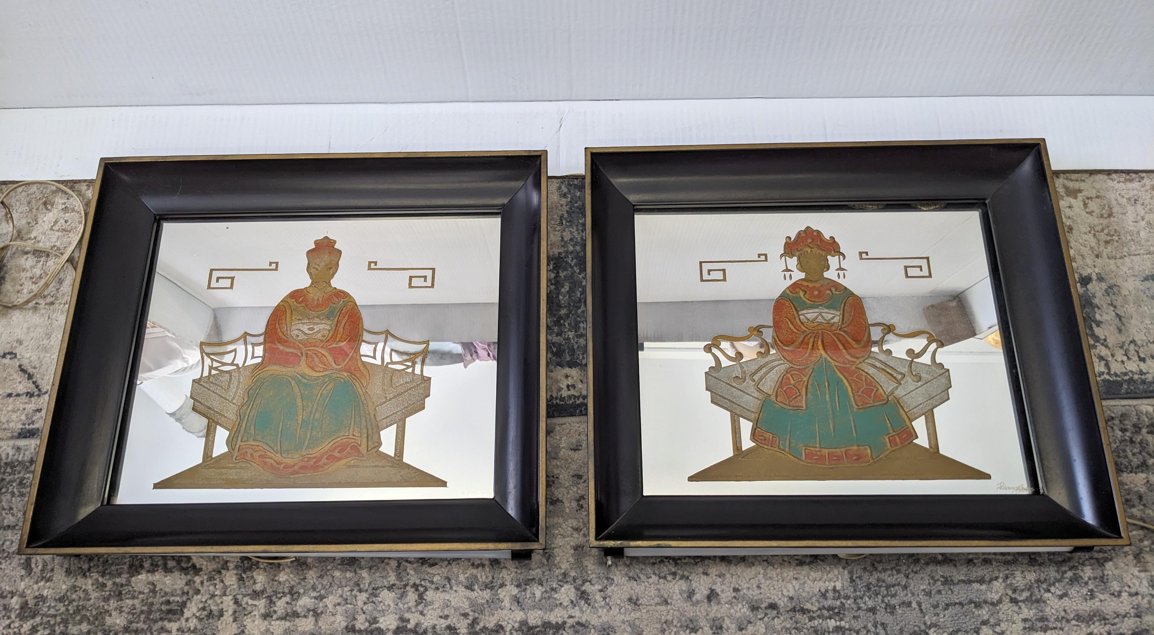 Pair of Mid Century Chinoiserie Illuminated Verre Eglomise Frames from the 1940's. A pair of Asian Nobles are beautifully reverse painted on mirror and set into a dimensional frame. There are fluorescent tube lights on top and bottom edge of each