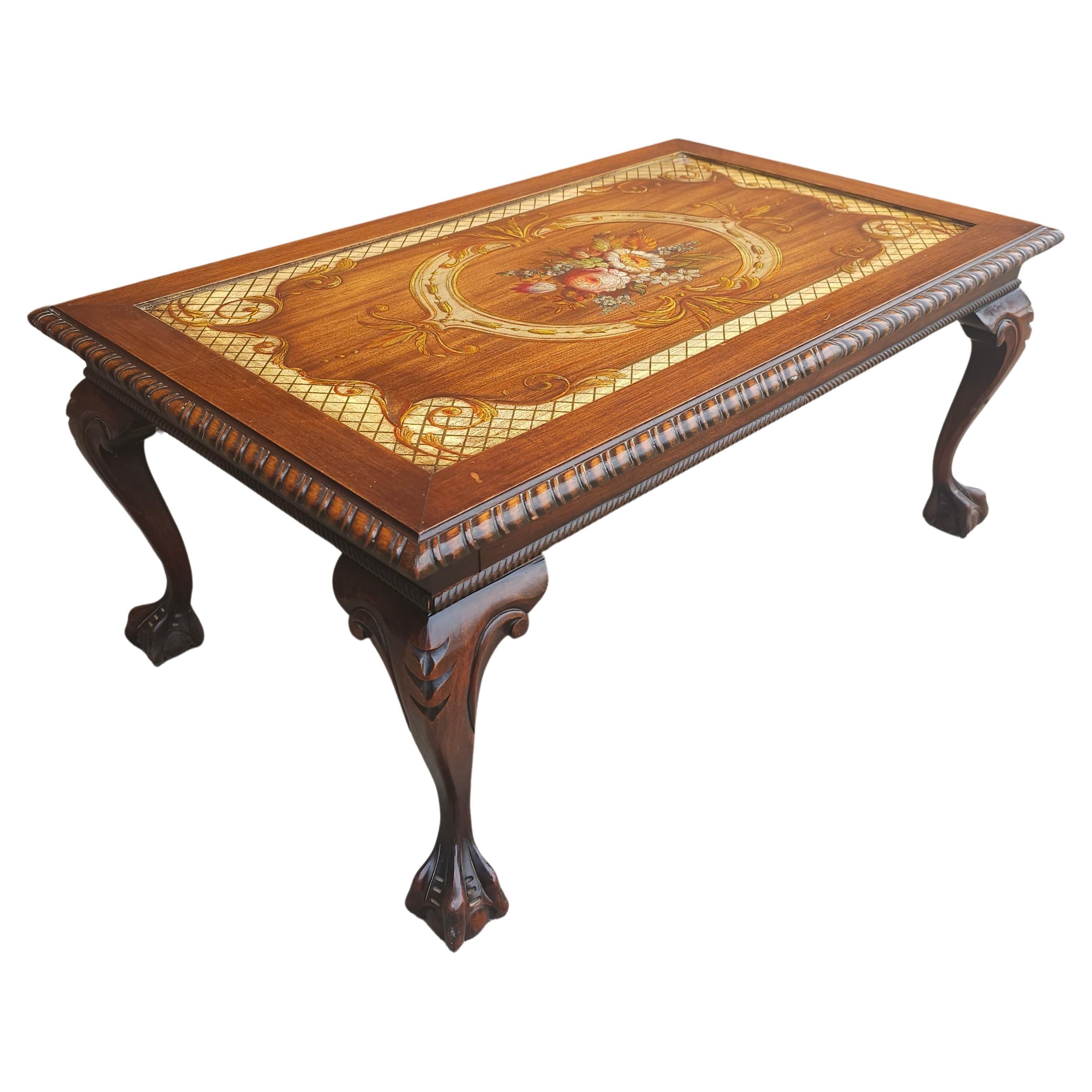 Mid Century Chippendale Carved and Ornate Mahogany  and Glass Inset Coffee Table with carved cabriole legs terminating with ball and claw feet,  in great vintage condition. Measures 35