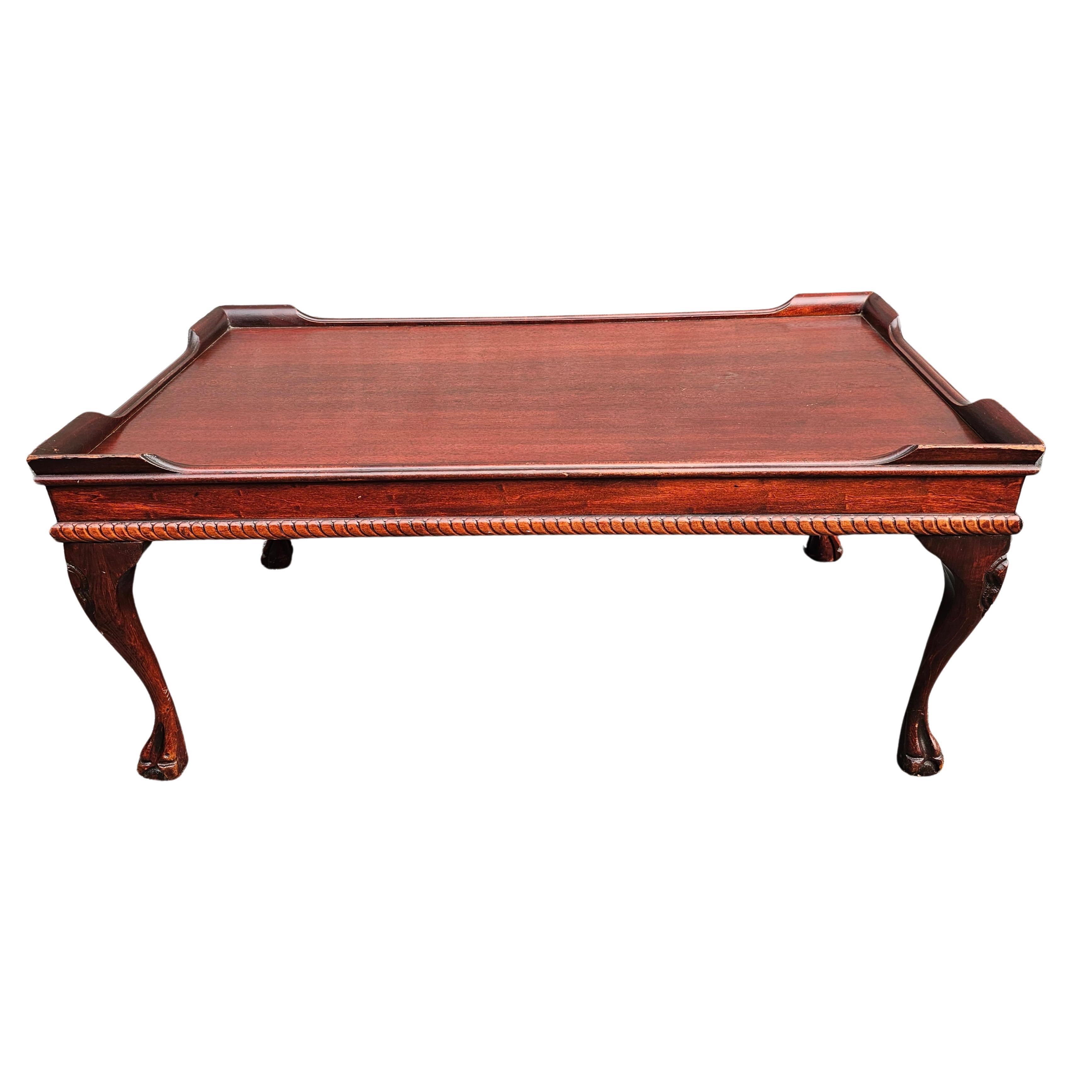 A Mid-Century Chippendale Style Mahogany coffee or cocktail Table with corner galleries. 
Light weight Solid mahogany. Measure 37