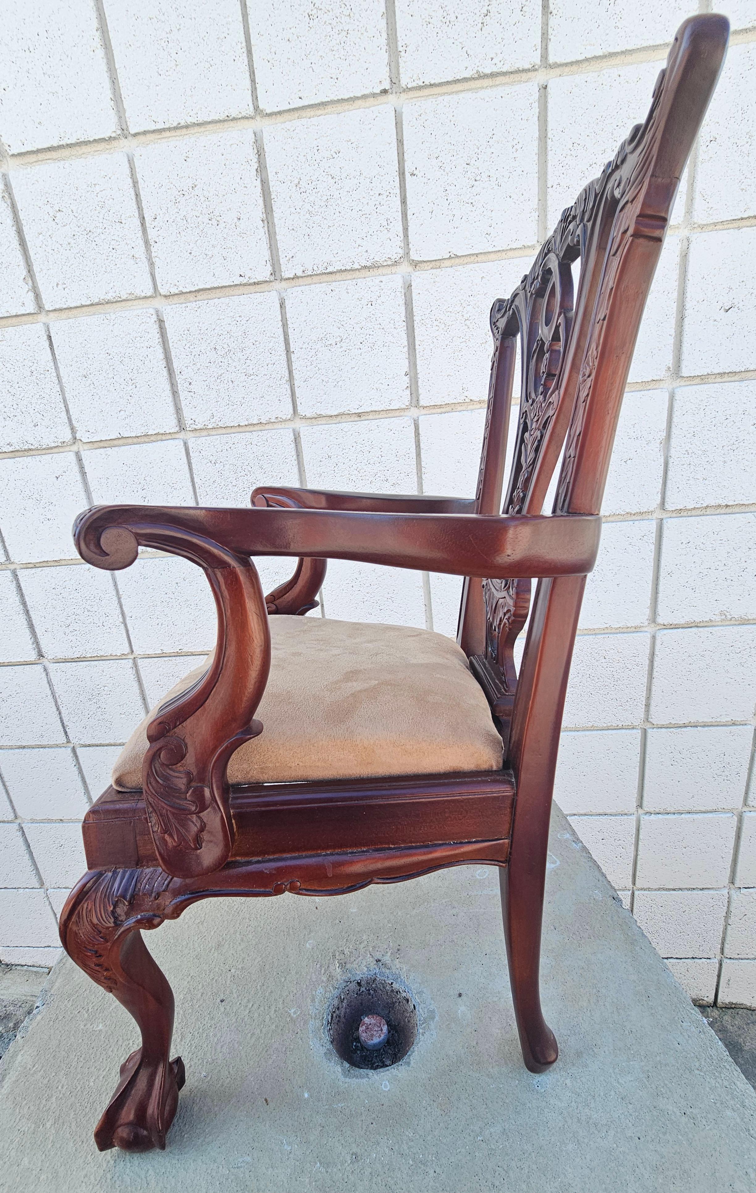 A mid Century Mahogany Chippendale Style carved Mahogany youth armchair with claw feet and Upholstered seat. Measure 15