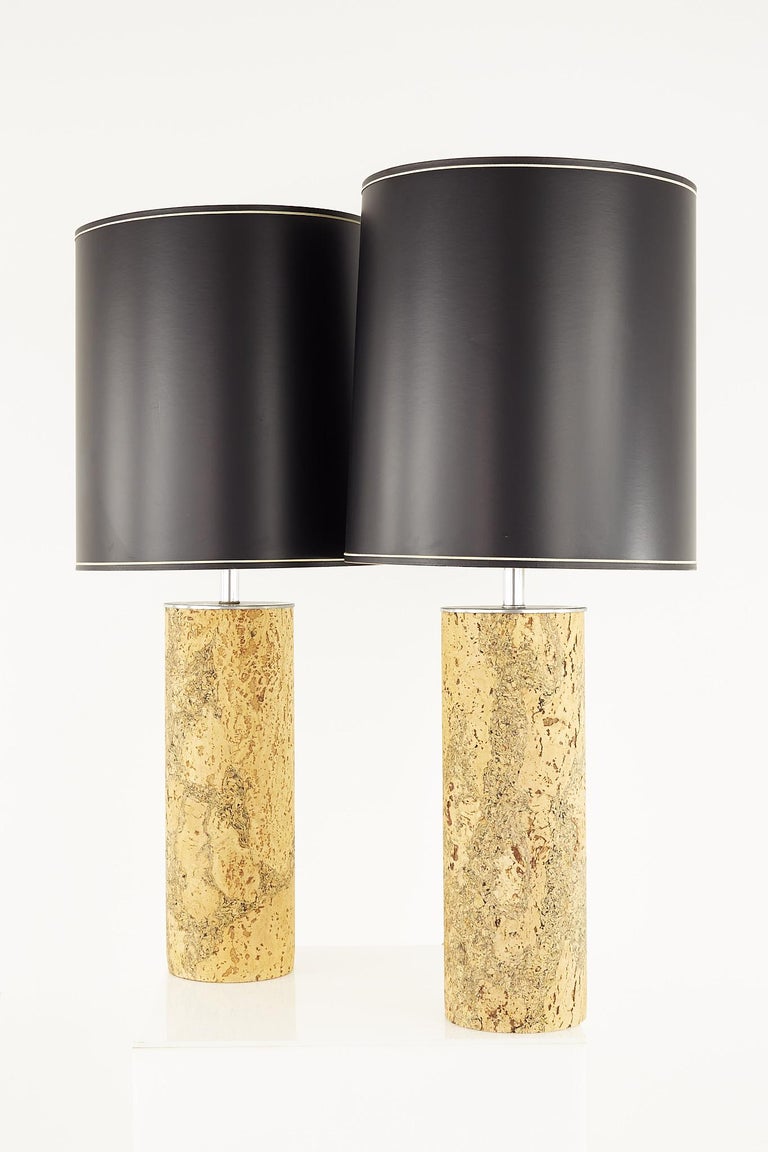 Mid Century chrome and cork table lamps - Pair

Each lamp measures: 15.25 wide x 15.25 deep x 37.5 inches high

These lamps are in excellent vintage condition

We take our photos in a controlled lighting studio to show as much detail as