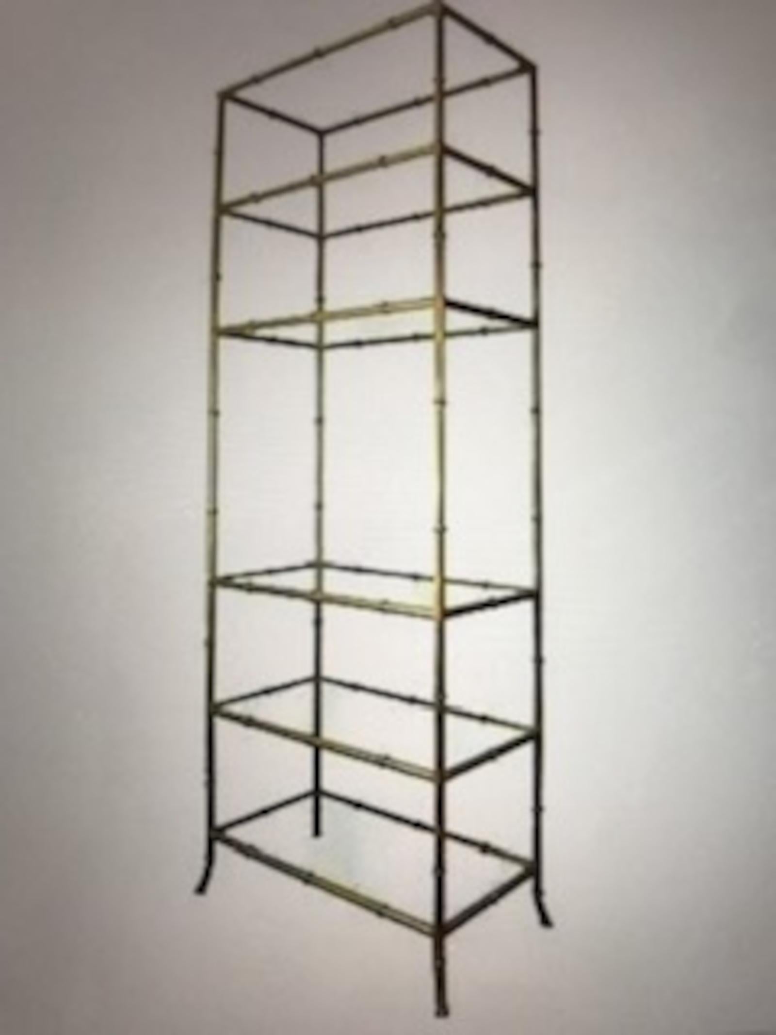 1970s Mid-Century Modern etagere with chrome frame and smoked glass shelves. Glass is sturdy weight and removable. Faux bamboo design. This piece can come apart / separate in middle into two separate pieces for easier moving and transport. 

In