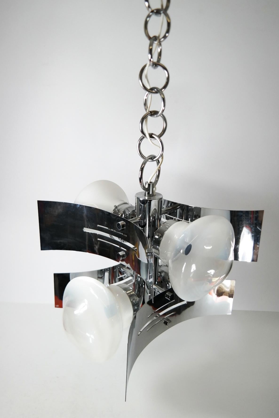Midcentury chrome chandelier with large hand blown glass bulbs.