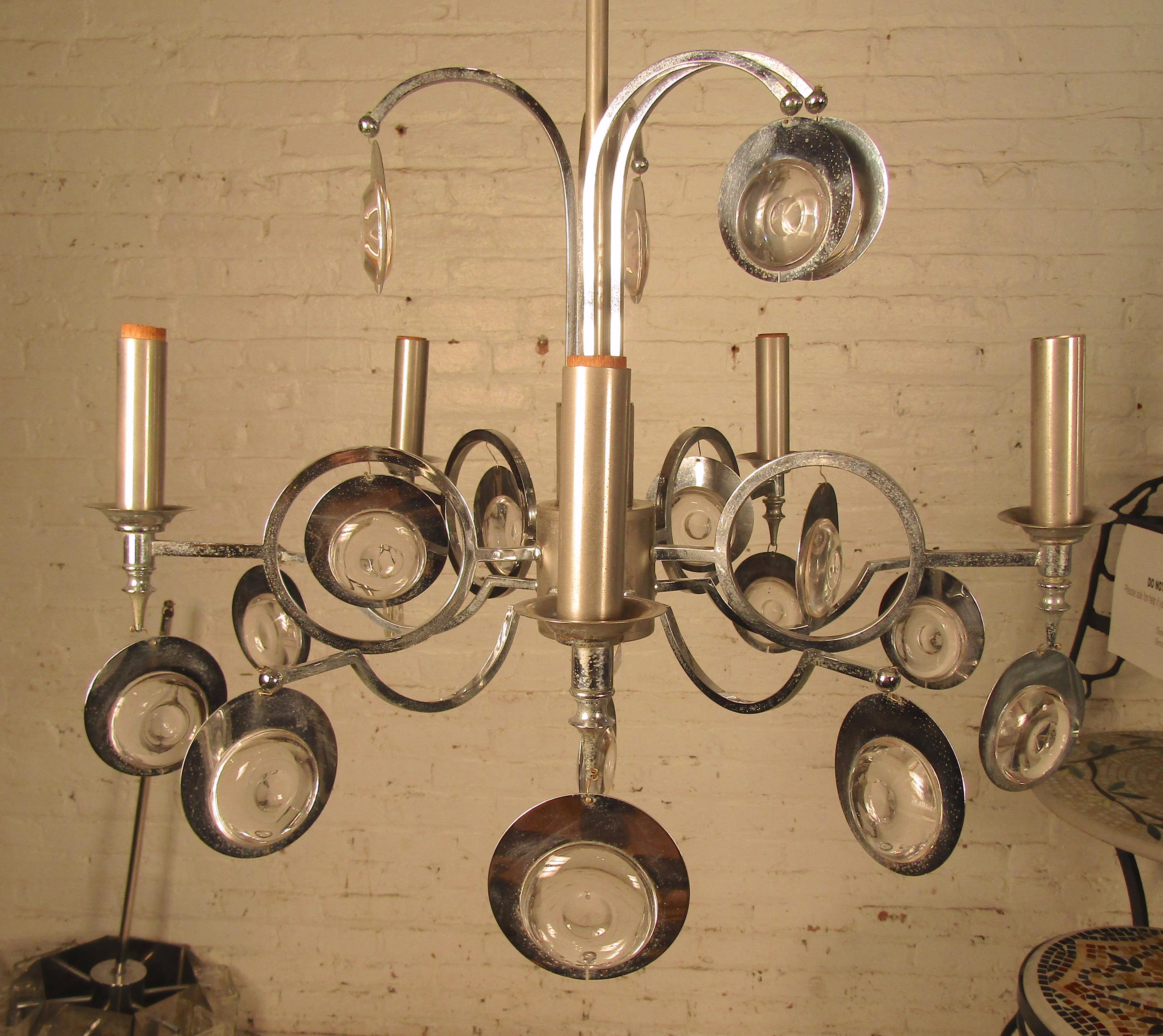 Candelabra bulb chandelier with polished chrome and glass ornaments.
(Please confirm item location - NY or NJ - with dealer).
  