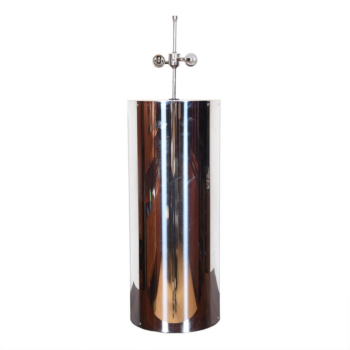 Dress your room up with this large chrome lamp from respected manufacturer Kovacs. Statement piece lamp from the 70s will lend a disco vibe to your space. Chunky like women’s jewelry from this period!
Use by itself or with its coppery little