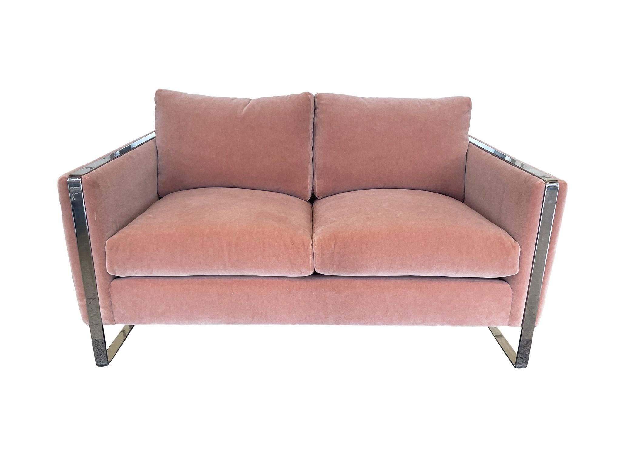 Wonderful midcentury chrome frame loveseat sofa in the style of legendary American designer Milo Baughman. Characterized by its sleek profile, clean lines, and subtly curved edges, this sofa is an excellent example of midcentury American furniture