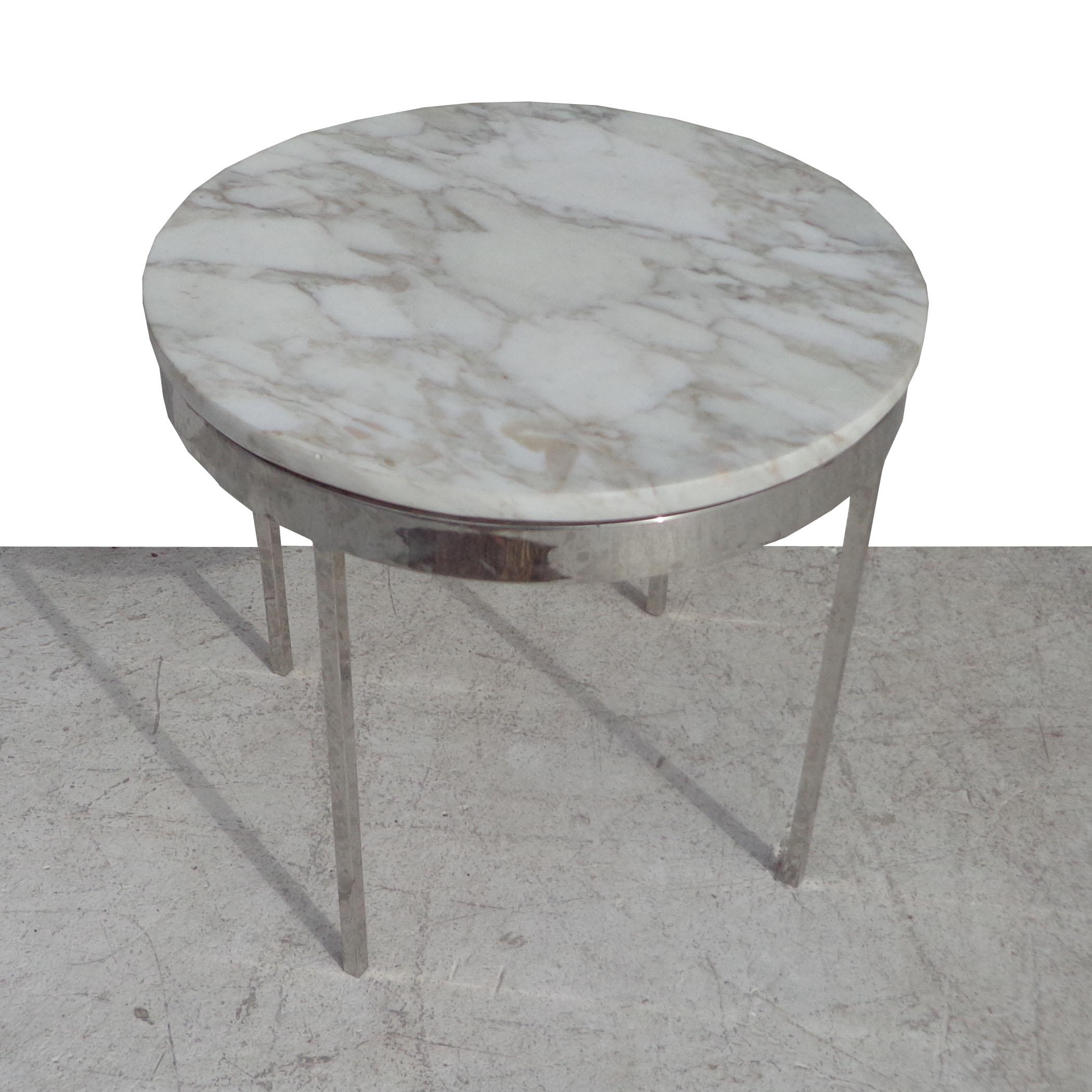 Mid Century chrome marble side table in the style of Zographos

Polished chrome base with a rich marble top.

Small chip & scratch on marble


 