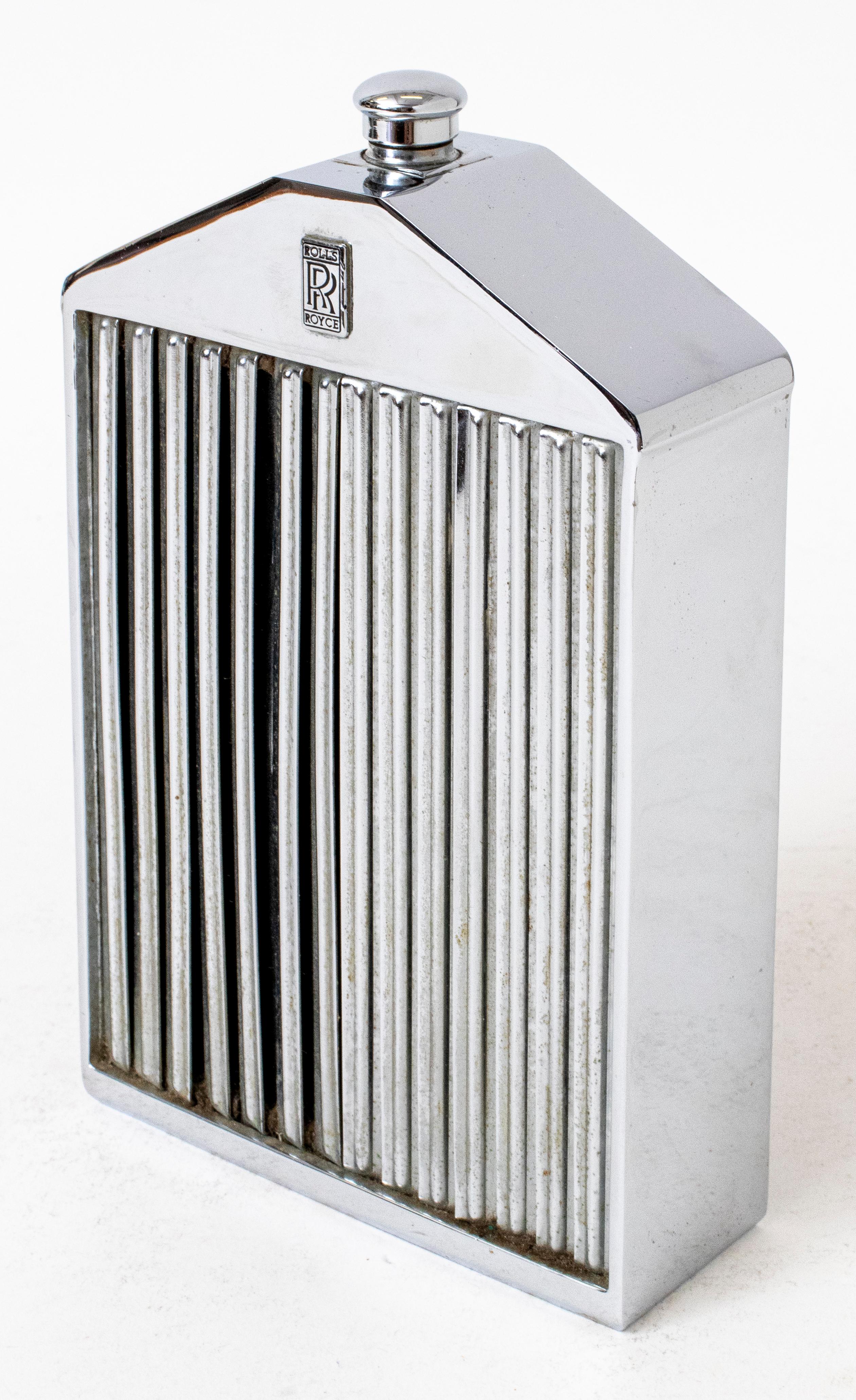 Mid Century chrome plate over metal Rolls Royce radiator grill with glass decanter. Authentic badge made in limited editions. Manufactured in England by Ruddspeed. Marked 
