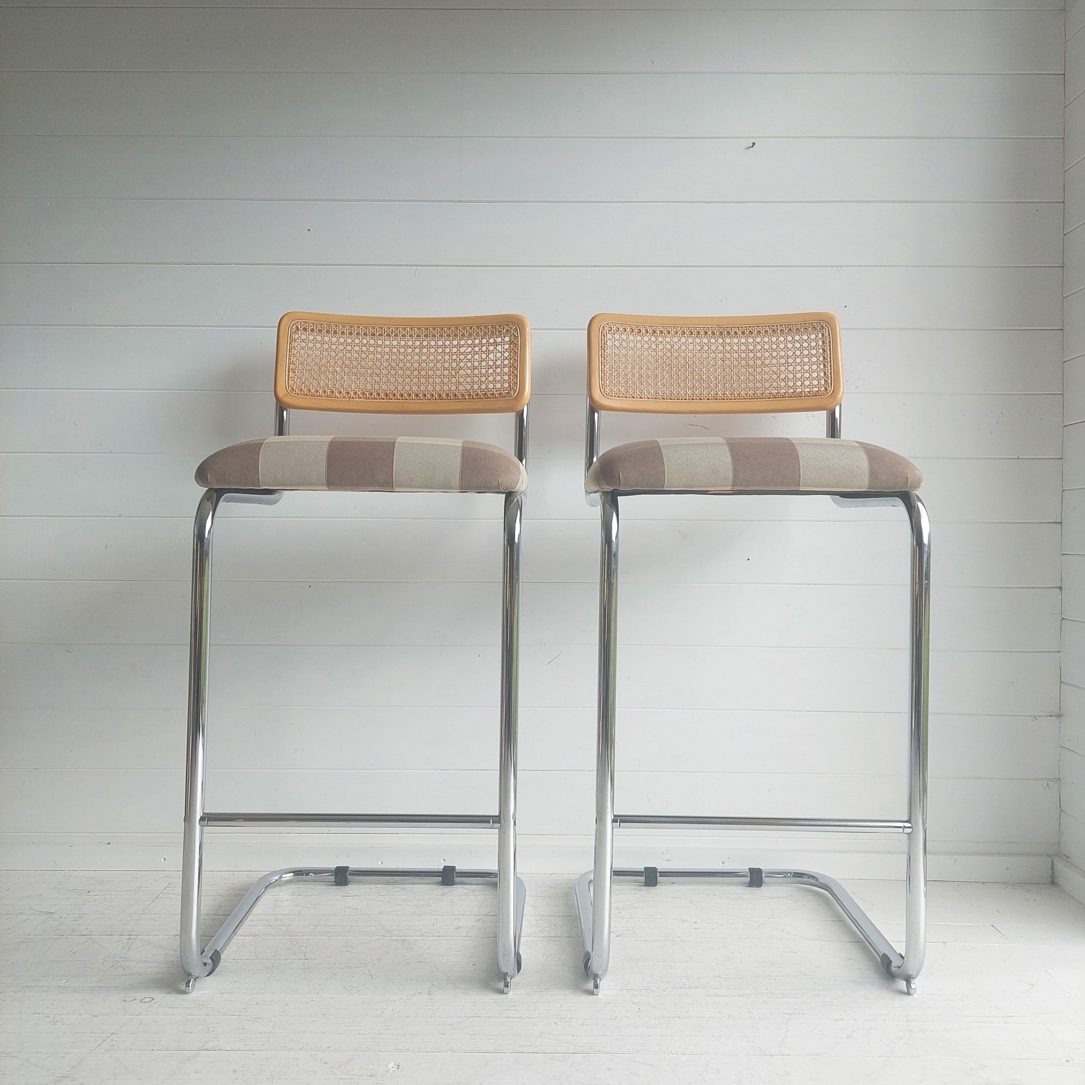 Set of 2  model S32 bar chair,.
The iconic Marcel Breuers Cesca like chair in bar stool version. It was probably made in Italy in the 80s. 

This sophisticated  and stylish pair of rattan, light beechwood upholstered seat and tubular steel bar stool