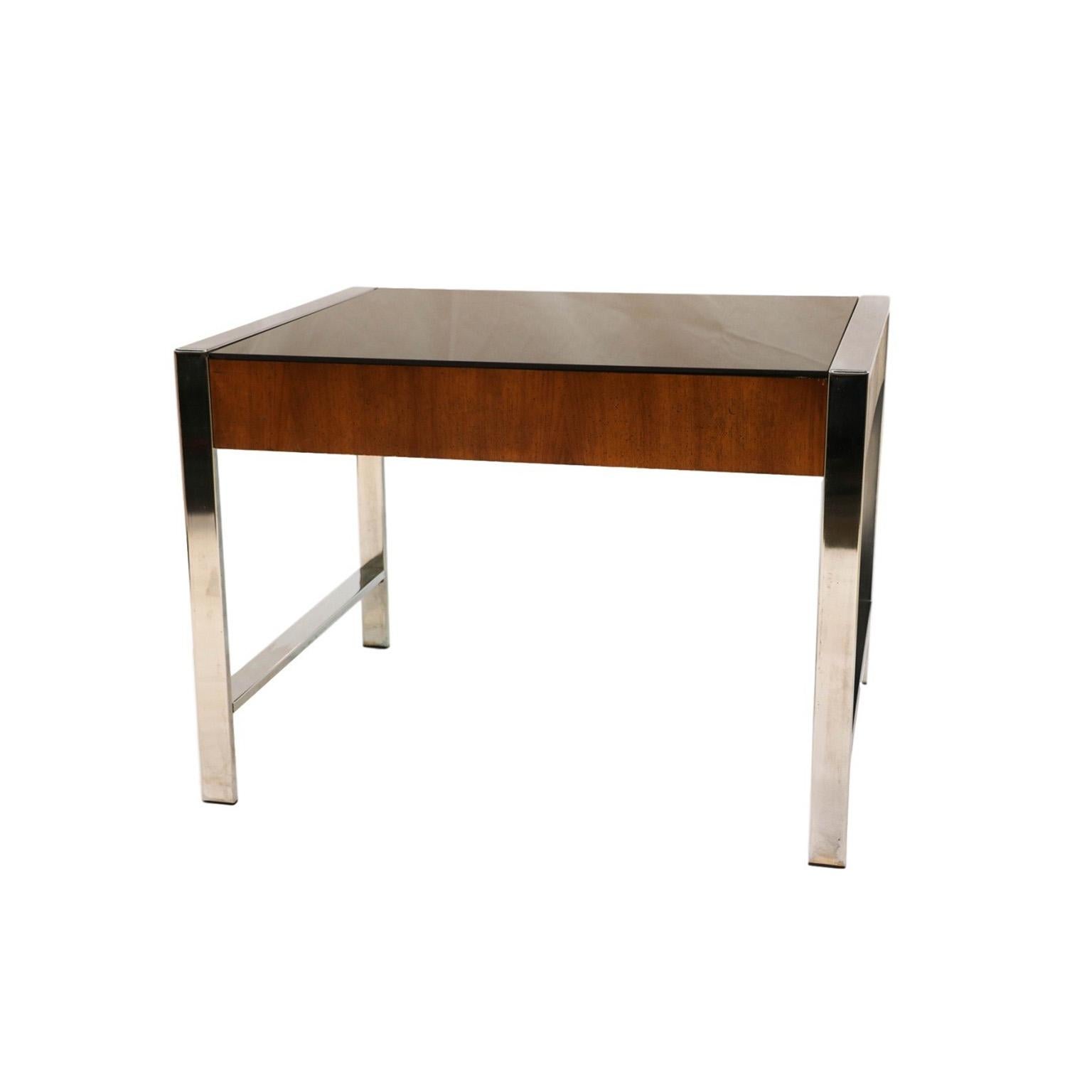 Mid-Century Modern side table and sleek designed in the manner of Milo Baughman. Features mirrored chrome framework with gorgeous warm walnut grain detail fitted with a dark, smoked glass top, very Minimalist, modern aesthetic. Would look great