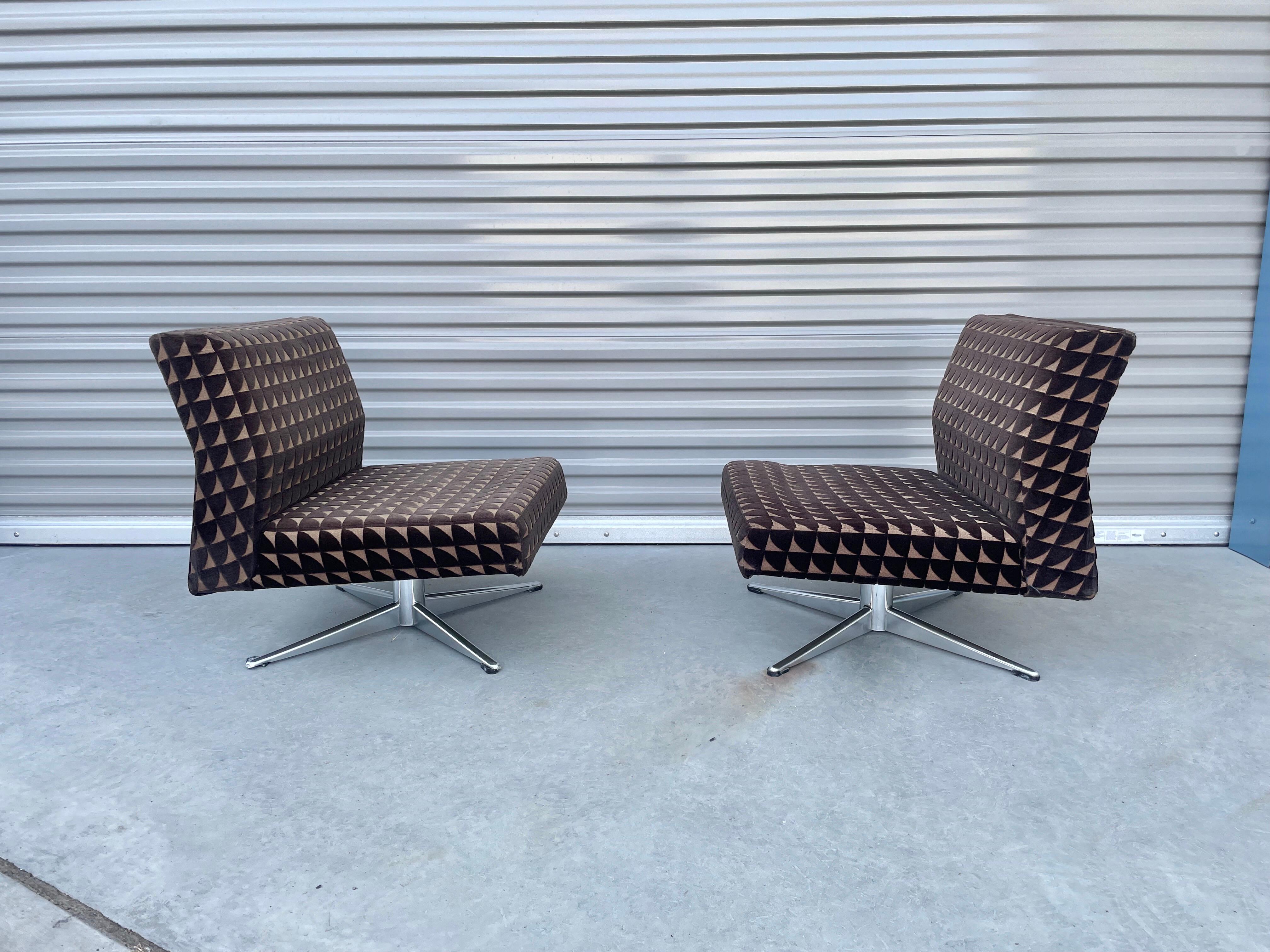 Mid-20th Century Midcentury Chrome Swivel Lounge Chairs