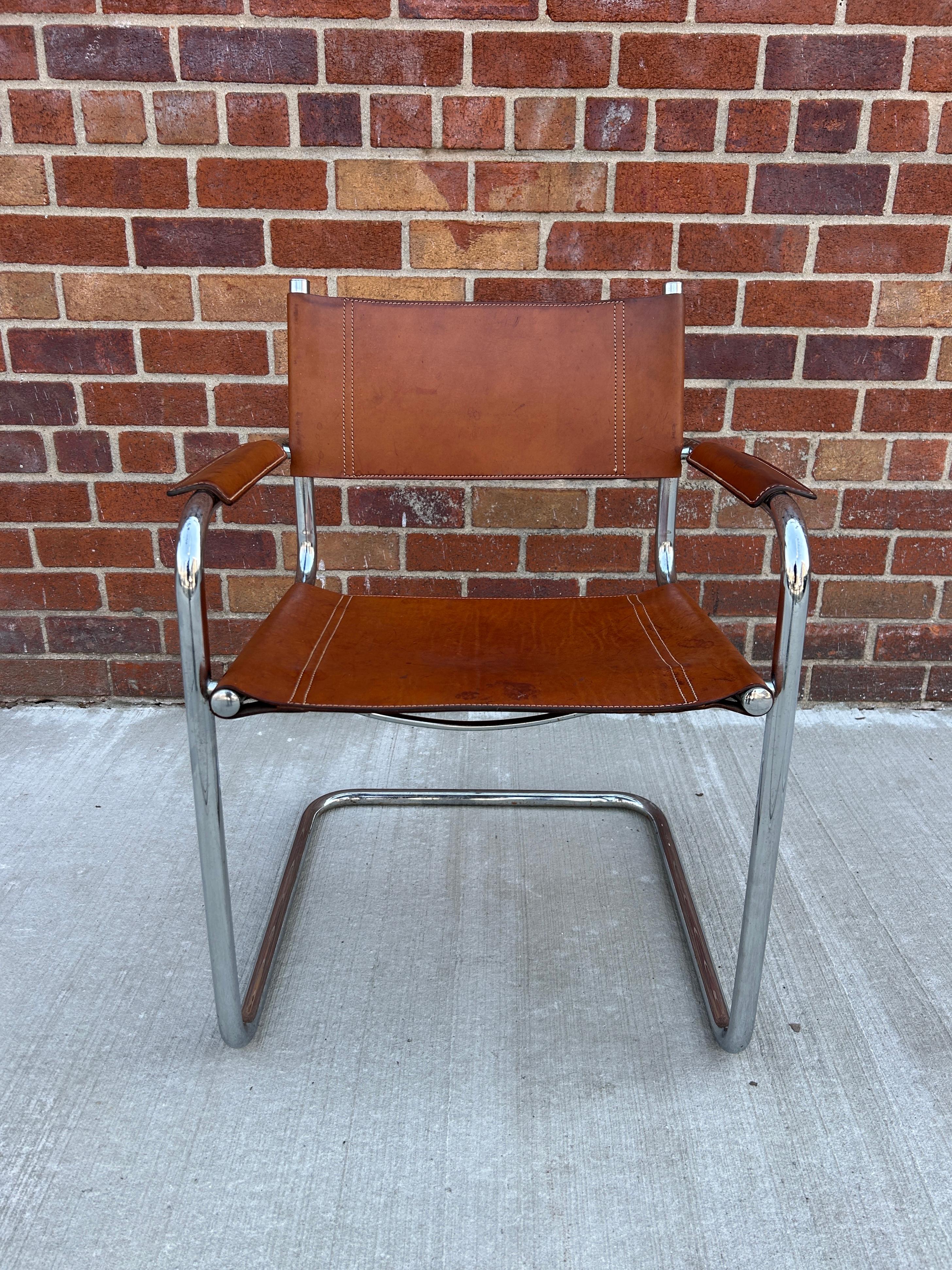 Mid century Vintage chrome tan leather Mart Stam model B34 chair. (4) chairs are available. These chairs are used worn with Patina on the beautiful brown leather. Great modern designed chairs. Made in Italy Circa 1970. Located in Brooklyn