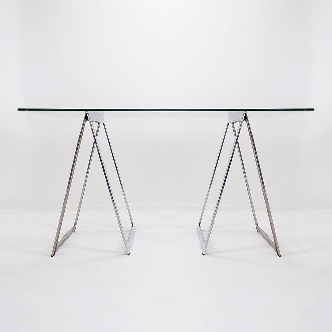 Mid-Century Chrome Trestles Desk, 1970s
Minimalist - table desk - Vintage furniture
Measures : 140x70cm H:74cm 
Materials : Chrome - Glass 
Light signs of oxidation on the trestles.
