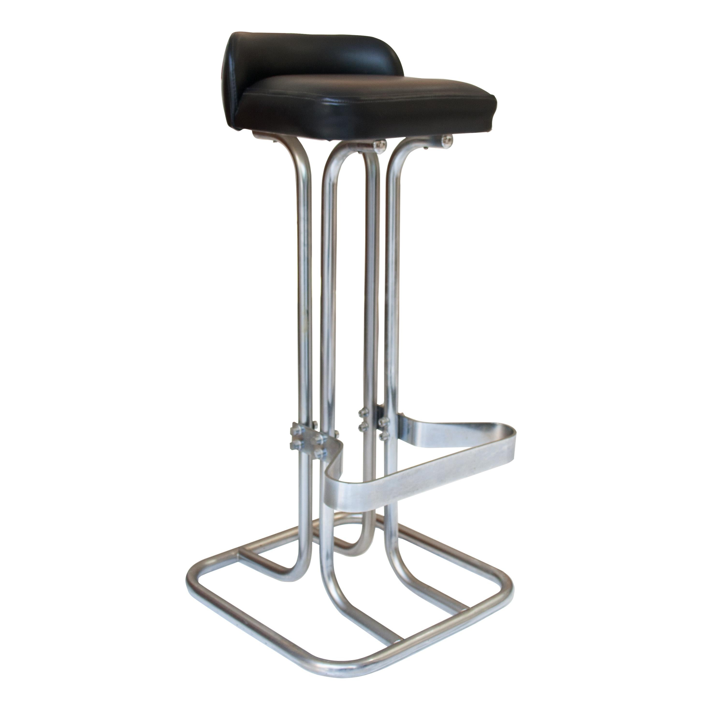 Pair of Italian bar stools. Chromed steel tubular structure with black leather upholstered seating.
 