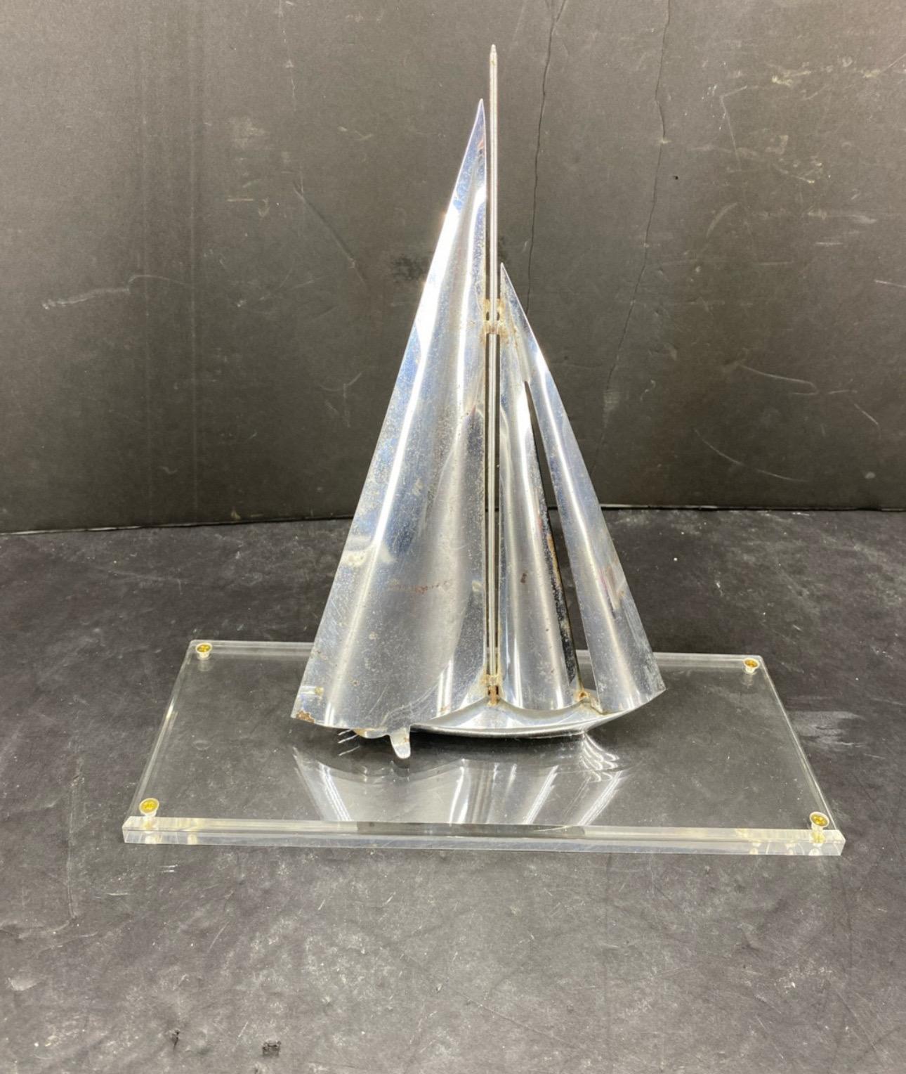 American Mid-Century Chromed Sailboat Sculpture on Lucite Stand For Sale
