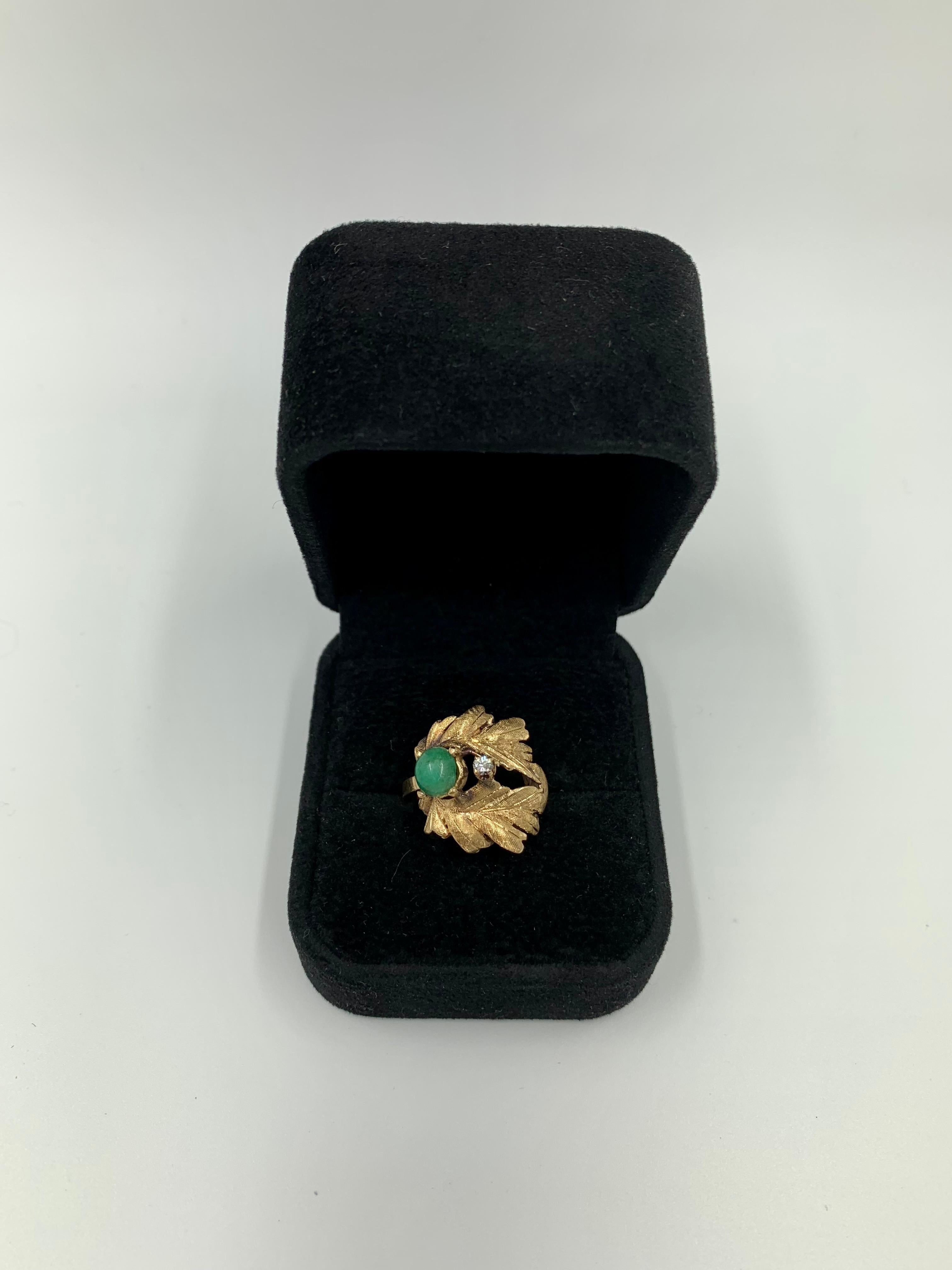 Unusual Mid Century 14k gold, diamond and cabochon chrysoprase textured Laurel Wreath ring.
Fine minute crosshatching detail on the highly original design of the gold wreath elements, beautiful workmanship. 
The Laurel Wreath was used in Ancient