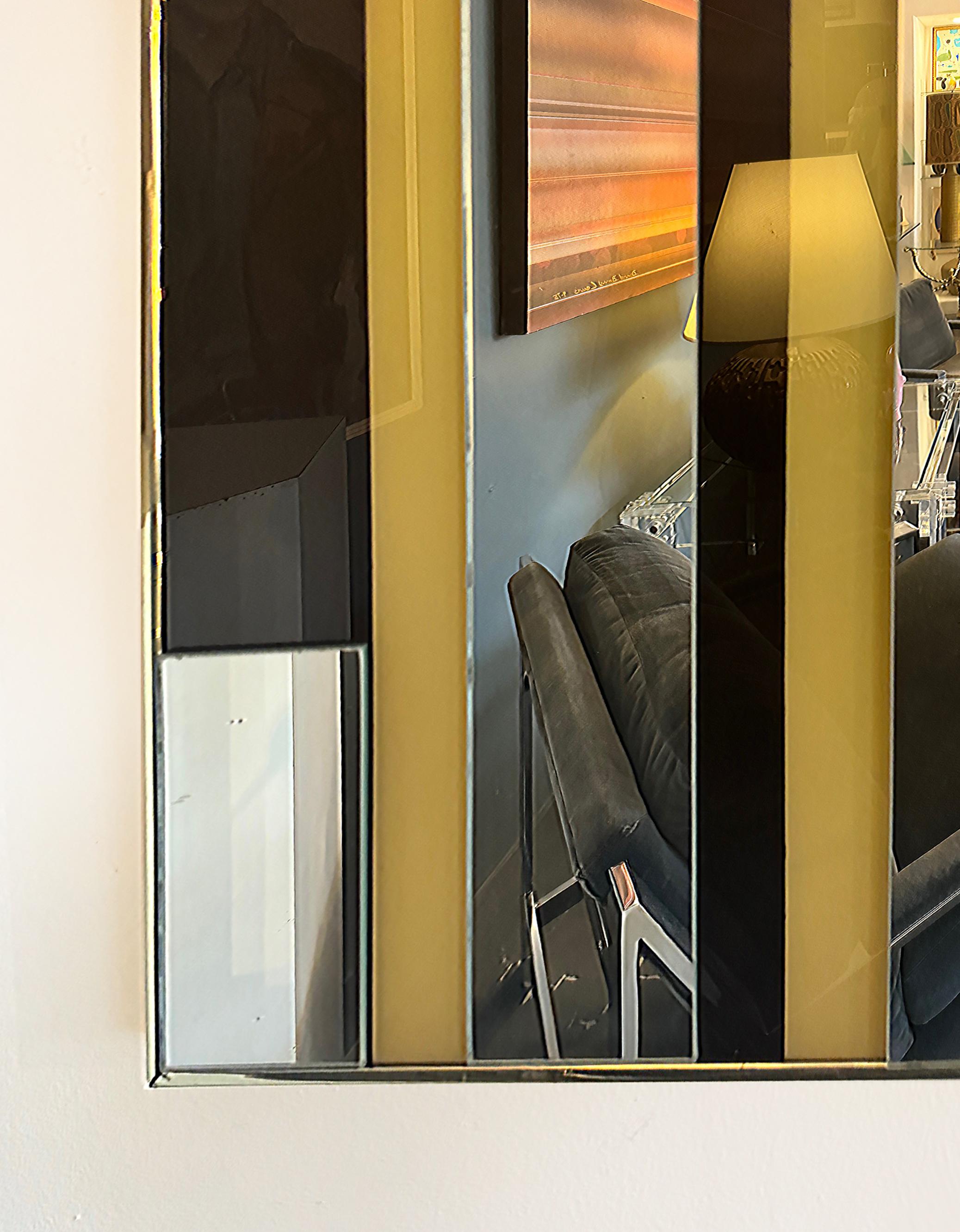 Mid-century Cityscape Wall Mirror Reminiscent of the New York City Twin Towers

Offered for sale is a vintage mid-century modern 1970s wall mirror depicting a cityscape reminiscent of NYC’s Twin Towers. The back background appears to be reverse