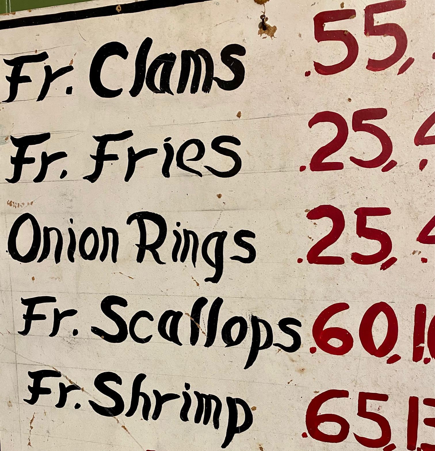 Vintage midcentury Clam Shack Menu Board, circa 1947, hand painted on Masonite panel. This sign came out of the former clam shack owner's basement in Hampton Beach, New Hampshire. It delightfully features all the classic summer beach foods, and