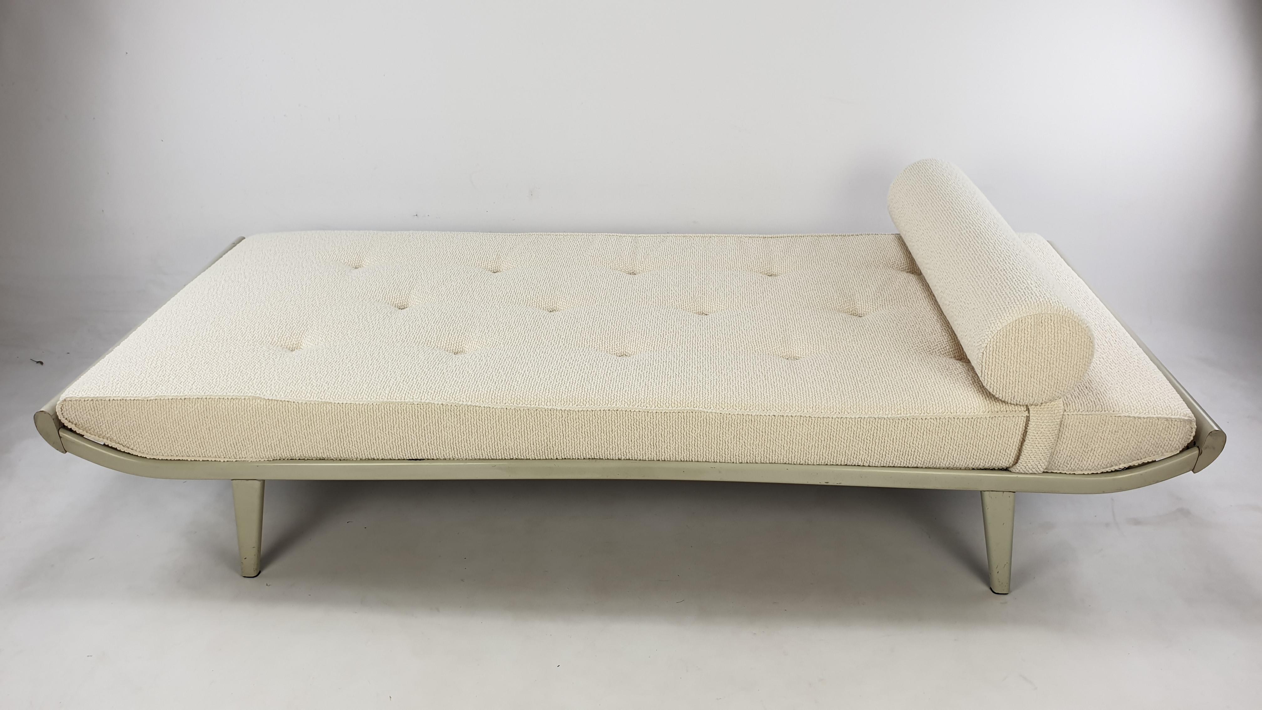 This Cleopatra daybed was designed by Dick Cordemeijer and was produced by Auping in the Netherlands in the 60's. Nice painted teak endings and powder-coated grey metal frame and feet. It has a new mattress and bolster and it has just been
