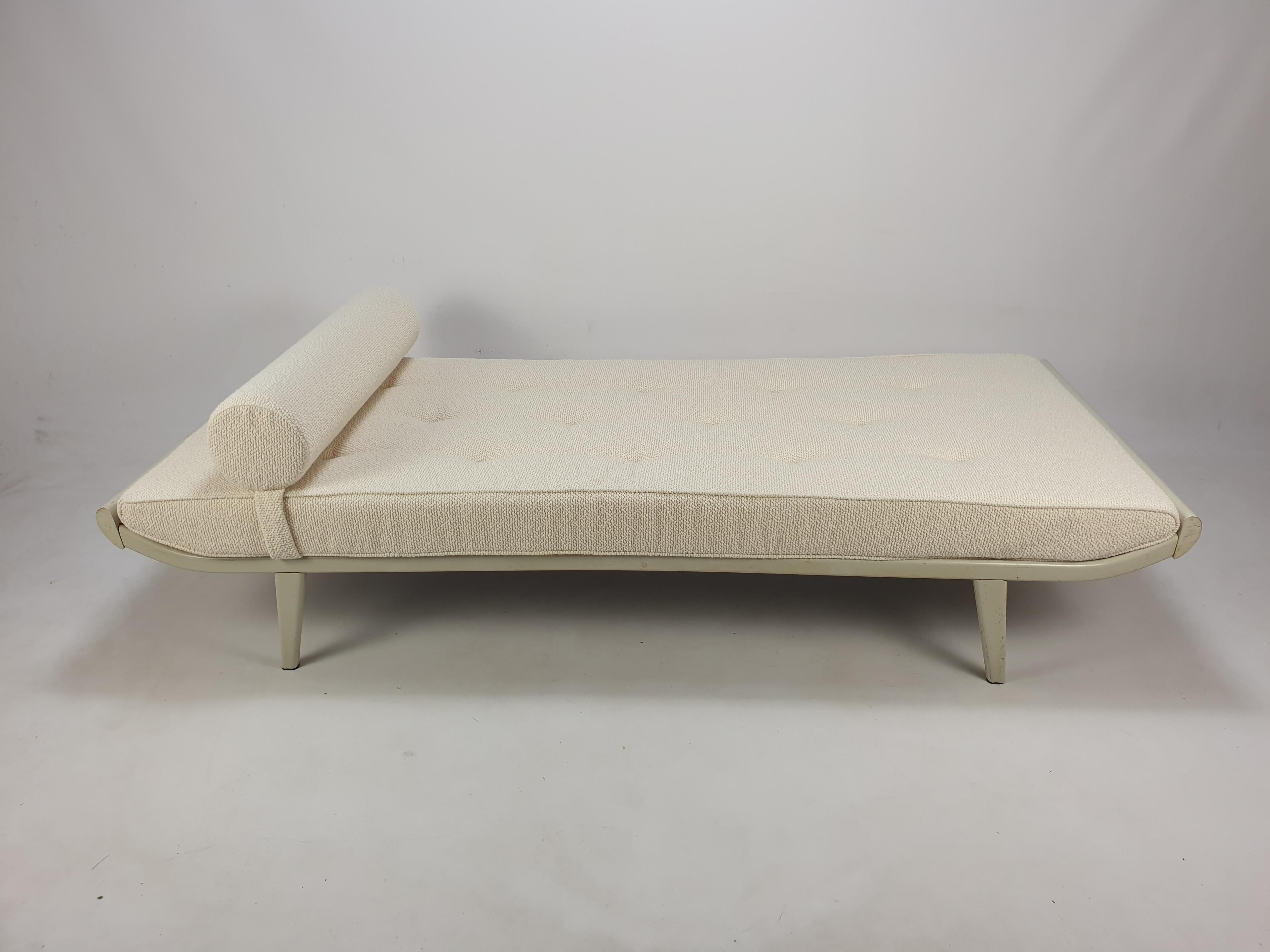 This lovely Cleopatra daybed was designed by Dick Cordemeijer and was produced by Auping in the Netherlands, 1960's. 

Nice painted teak endings and powder-coated grey metal frame and feet. 

It has a new mattress and bolster and it has just