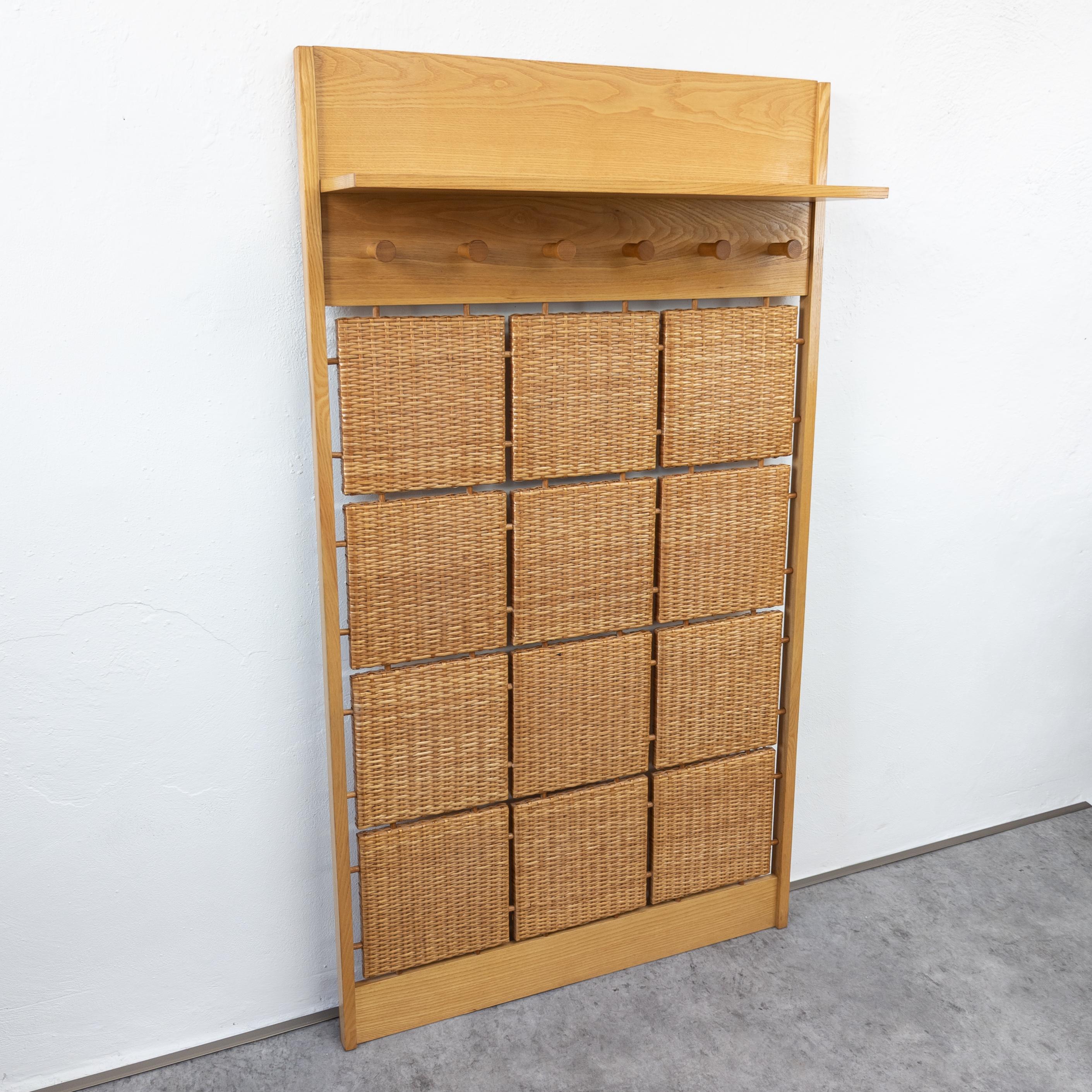 Entry hall wall coat rack designed by Jan Kalous, manufactured by ULUV, former Czechoslovakia in 1960's. Made of beech wood and rattan. In excellent original condition. Height 120 cm, width 90 cm, depth 25 cm.