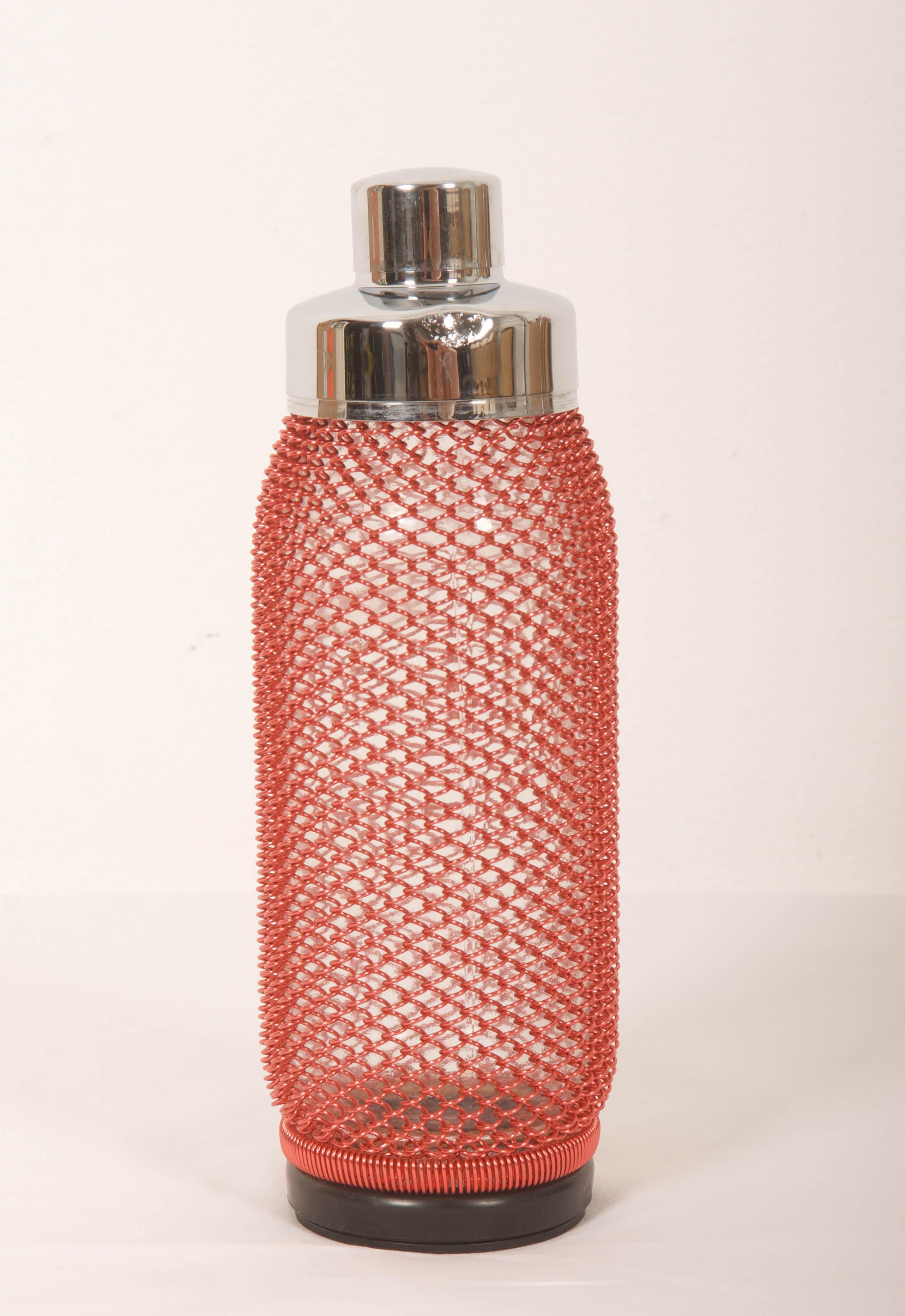 Glasflasche mit rotem Drahtgeflecht und einem Deckel aus den frühen 1970er Jahren.