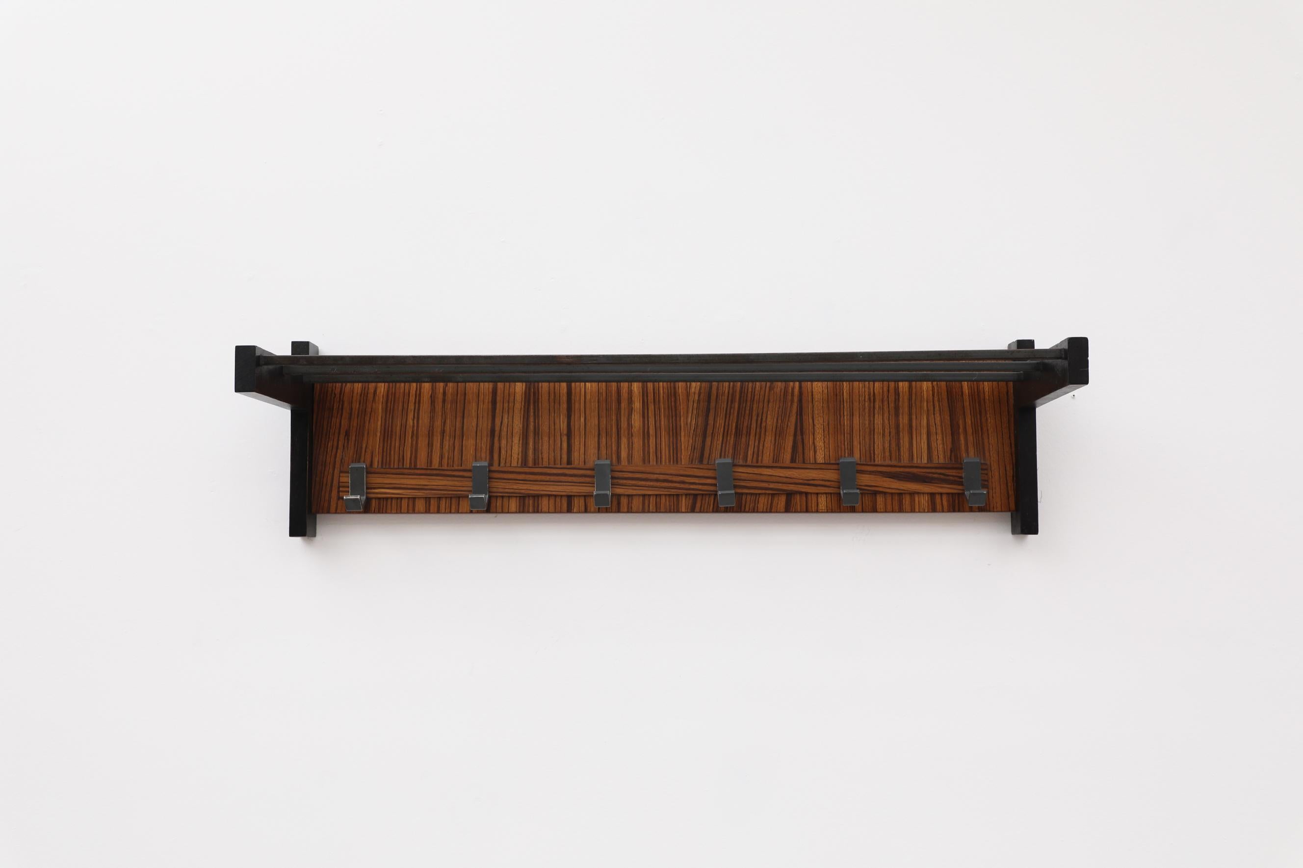 Mid-Century Modern Midcentury Cocobolo Wood and Metal Wall Mounted Coat Rack with Hooks For Sale
