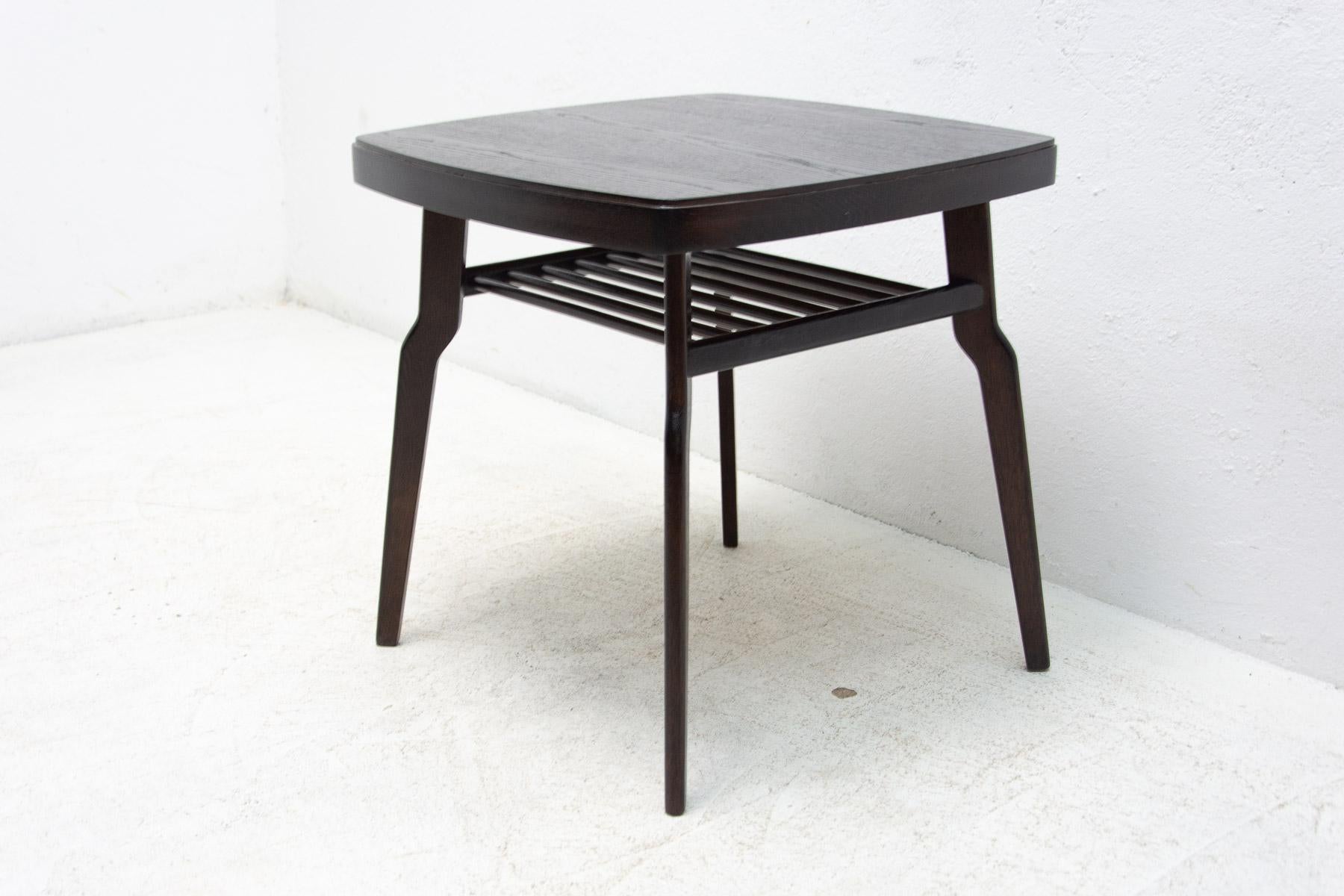 Mid century coffee table was made in the former Czechoslovakia in 1954. It was made in the JITONA company. It´s made of dark stained oak wood. In excellent condition-fully renovated.

Height: 60 cm

Width: 60 cm

Depth: 60 cm.