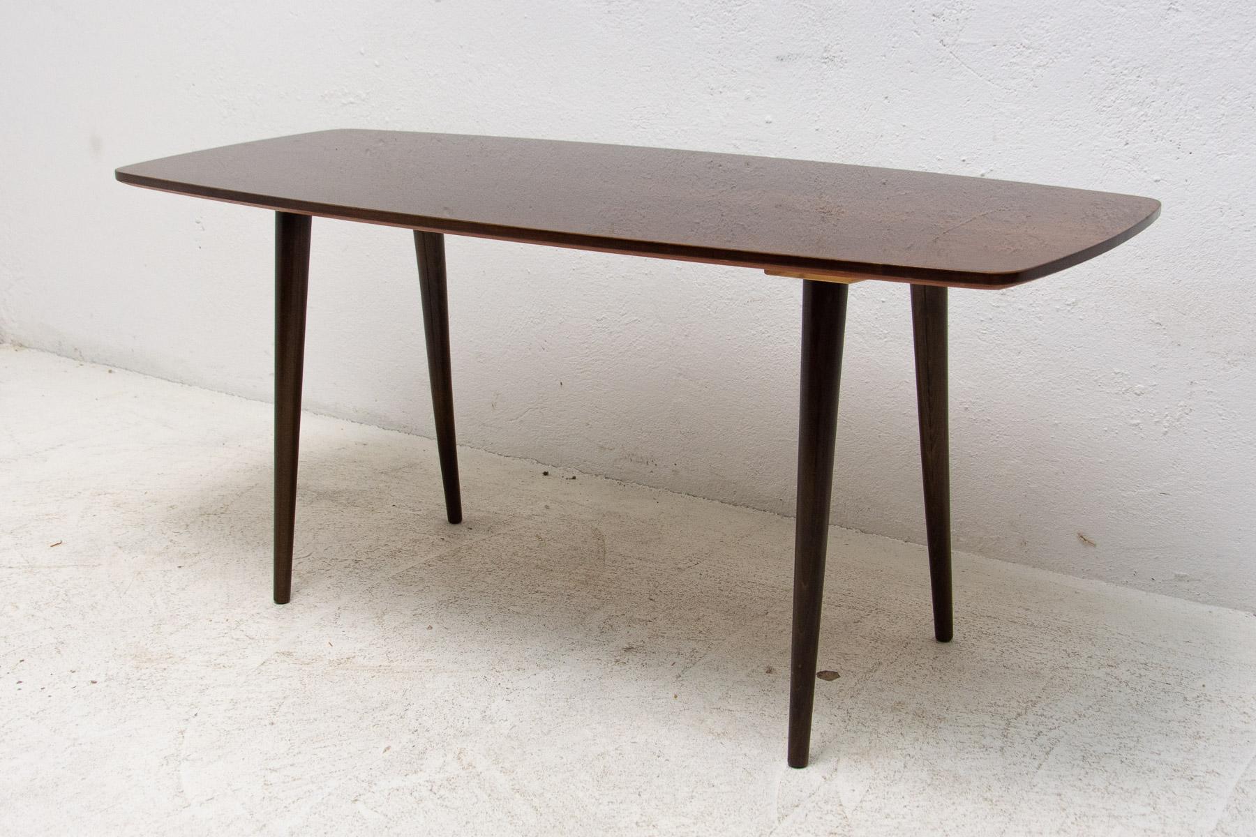 Mid-century coffee table produced in JITONA company in the 1970's. Made of stained beech wood, associated with world-renowned exhibition EXPO 58 in Brussels. In excellent condition, completely renovated.

Height 53 cm

Length 120 cm

width 51