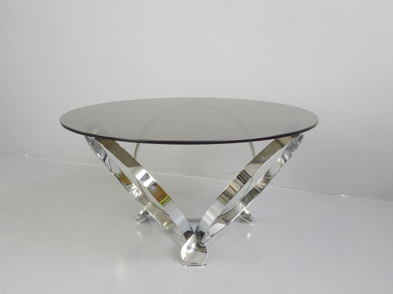 Mid century coffee table by Knut Hesterberg, Circa 1970s

- Circular chromed base
- Heavy smoked glass top
- By Knut Hesterberg
- German, 1970s
- Measures: 100cm wide x 52cm tall

Condition report

Some light scratches to the top and base