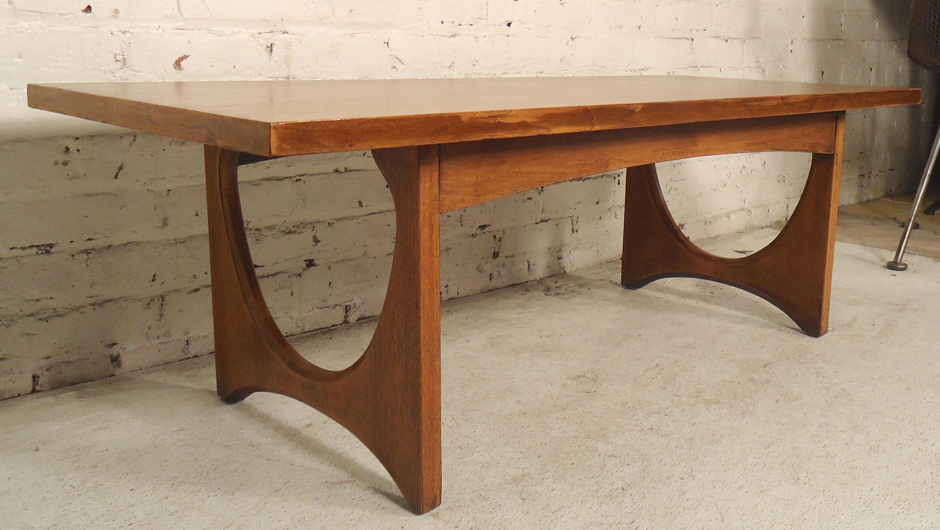 Smaller sized table in the style of Broyhill with sculpted base.
(Please confirm item location - NY or NJ - with dealer).
 