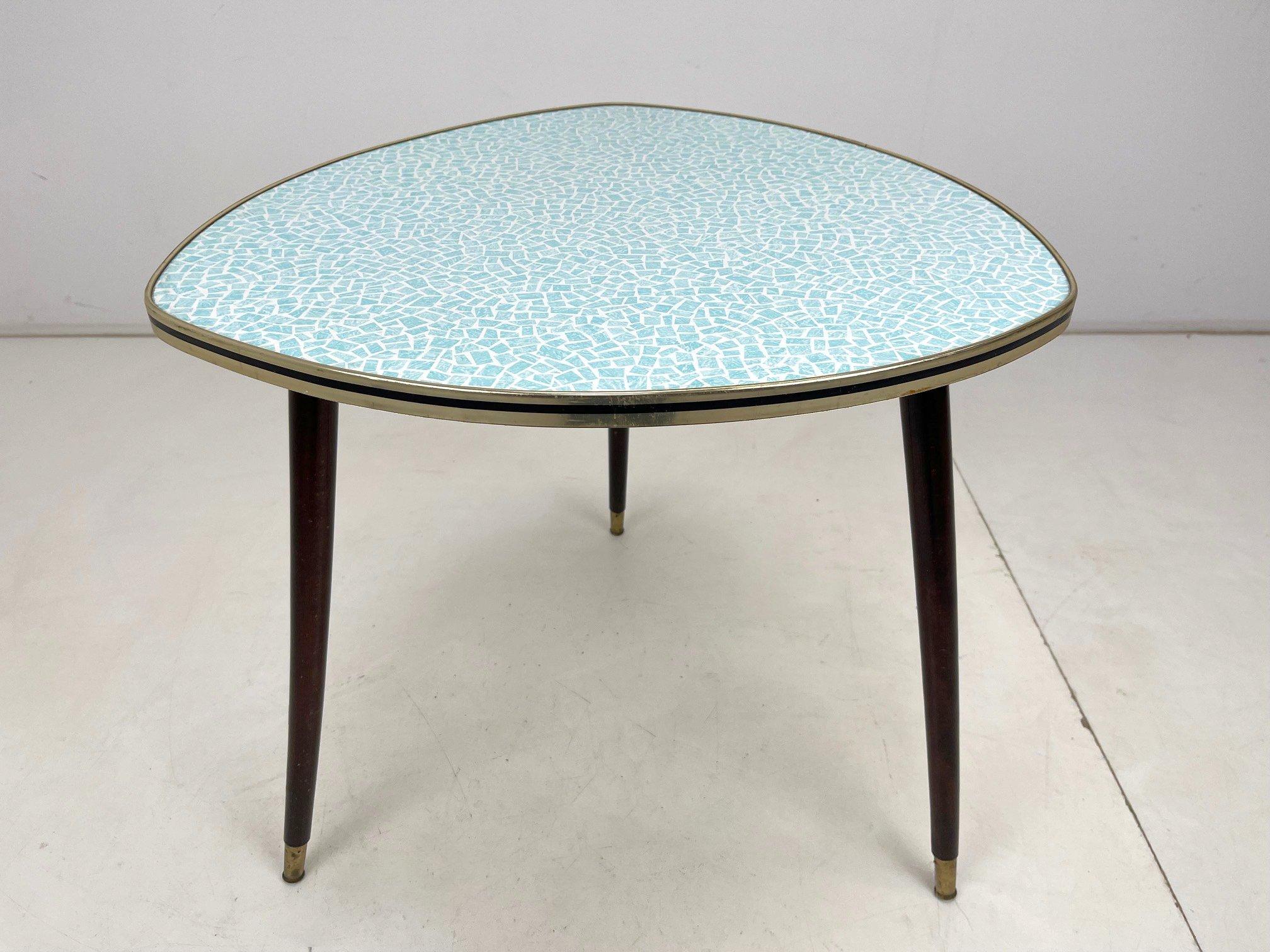 Vintage coffee table produced in Germany in the 1960's to 1970's.
