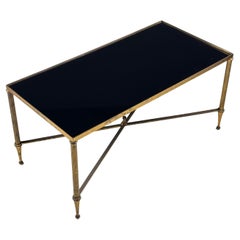 Mid-century coffee table with black glass top