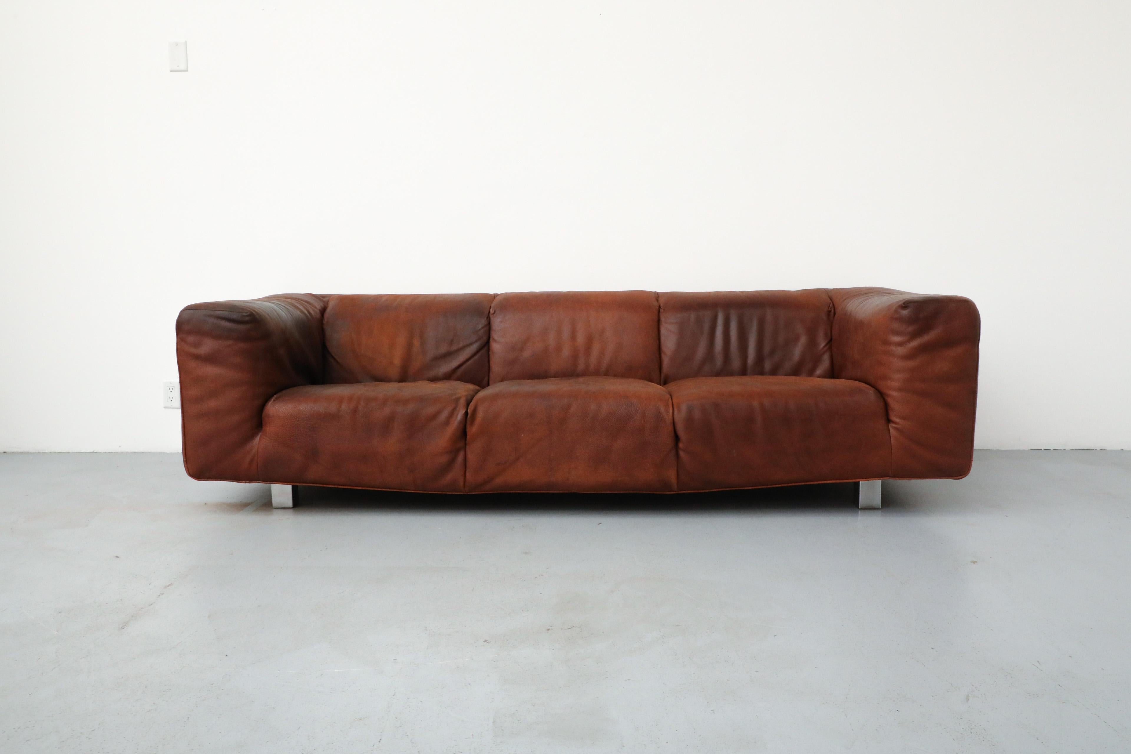 Mid-Century 'Bommel' sofa in gorgeous cognac leather by acclaimed innovative Dutch designer Gerard van den Berg for his own Label, 1985. It is a stunning soft form sofa with beautiful deep patina on the leather and is in original condition with some