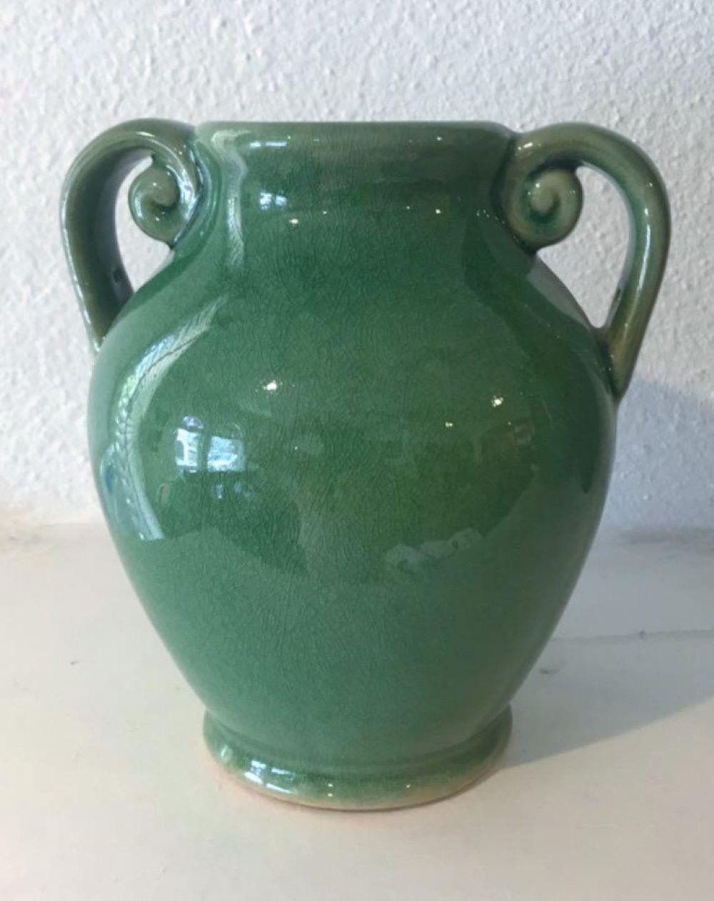 These fantastic green pottery vases are in pristine condition and came from a private collection. Great color and presence.
measures: Small 4.5 wide x 6 high
Med. 7 wide x 7 high
Large 8 wide x 12 high.
