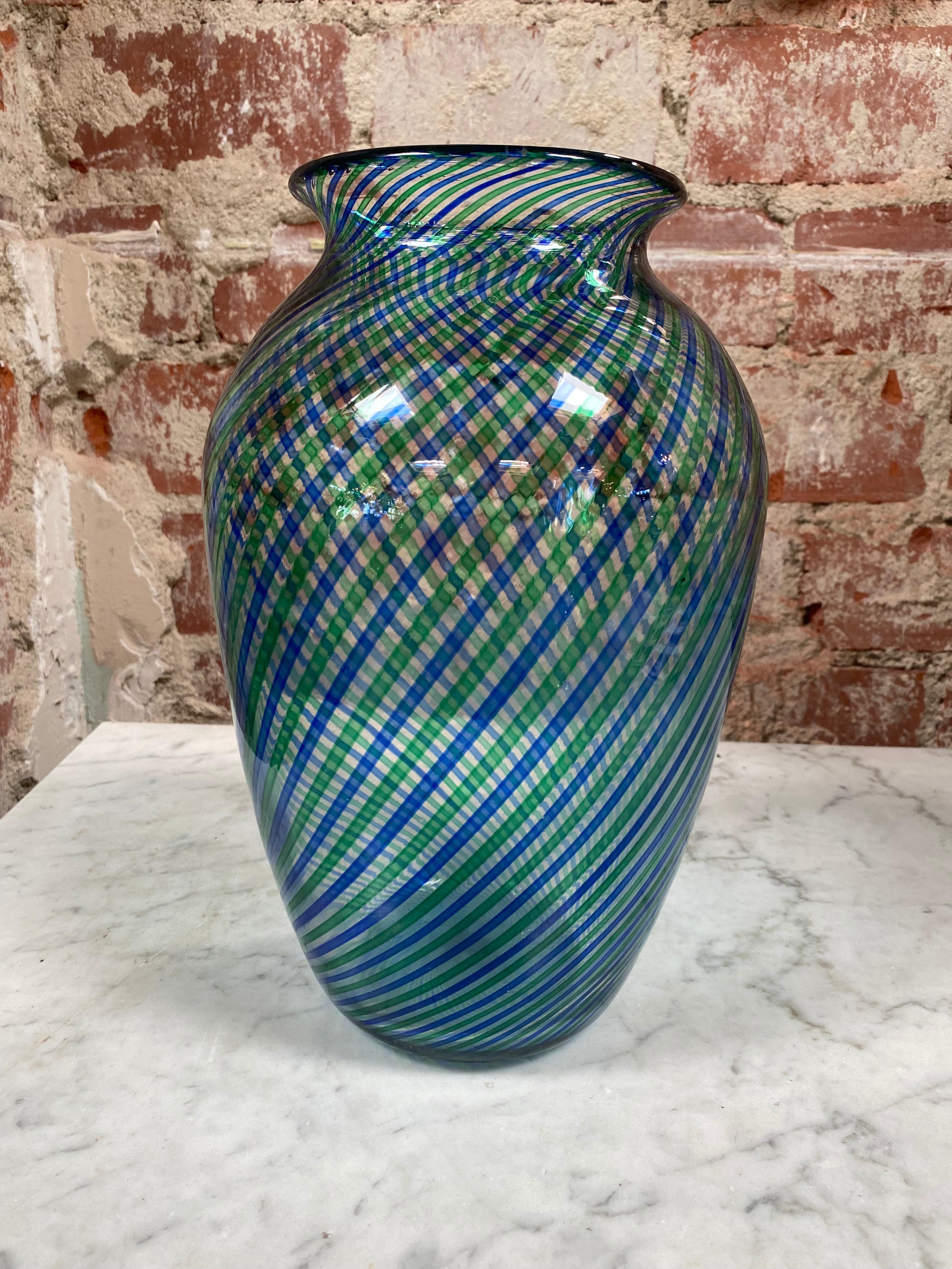 Stunning glass vase multicolor in a beautiful and unique shape made in Italy 1970s.
