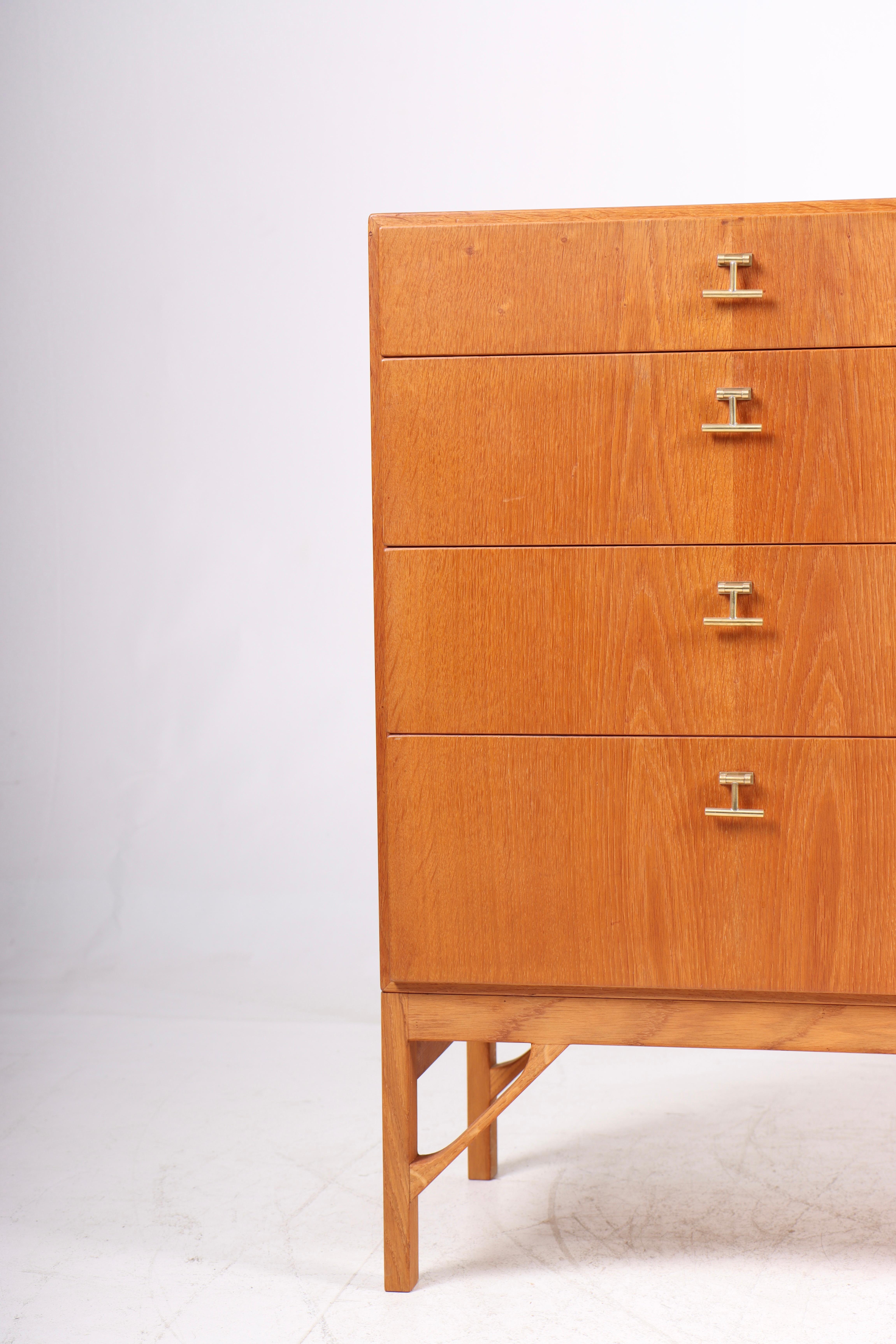 Commode in Scandinavian oak with hardware in brass. Designed by MAA. Børge Mogensen in the 1950s, this piece is made by CM Madsen cabinetmakers, Denmark in the 1960s. Great condition.