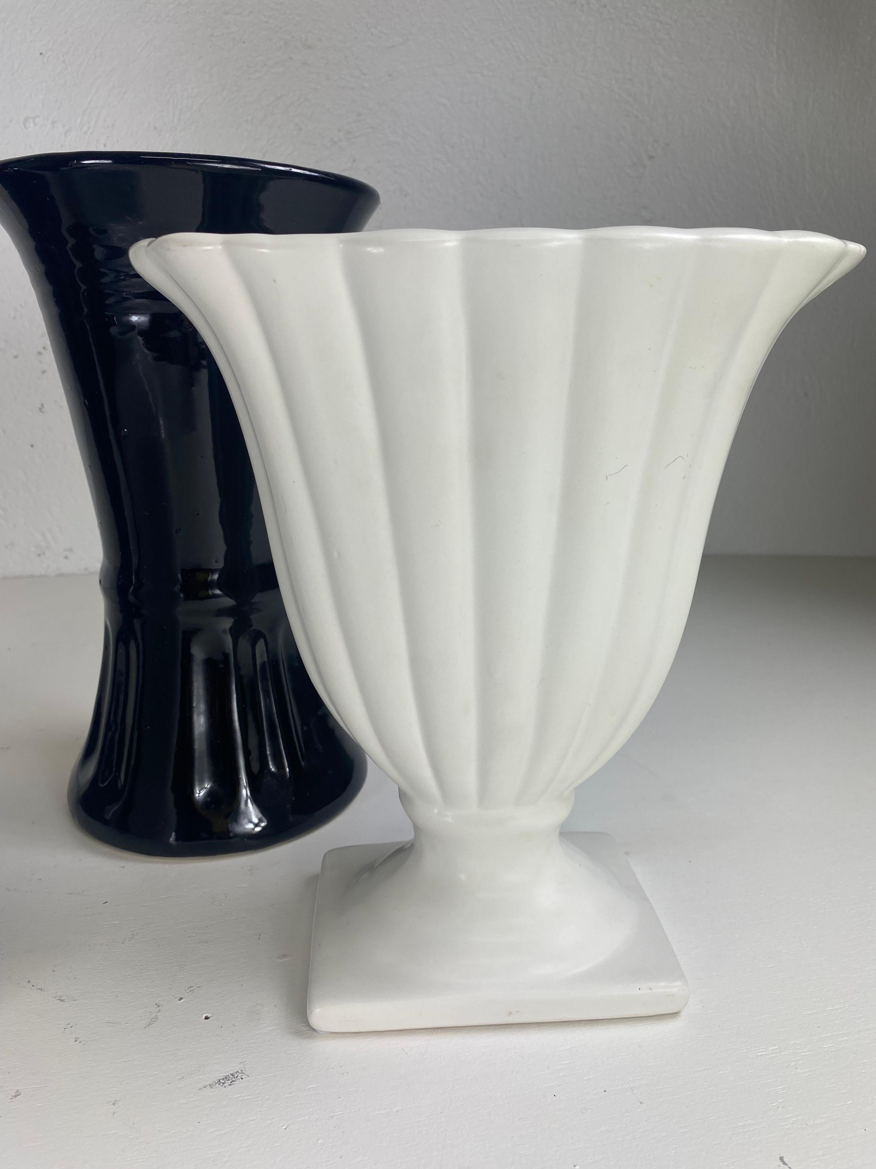 Mid century complementary grouping of black and white pottery vases. For Sale 2