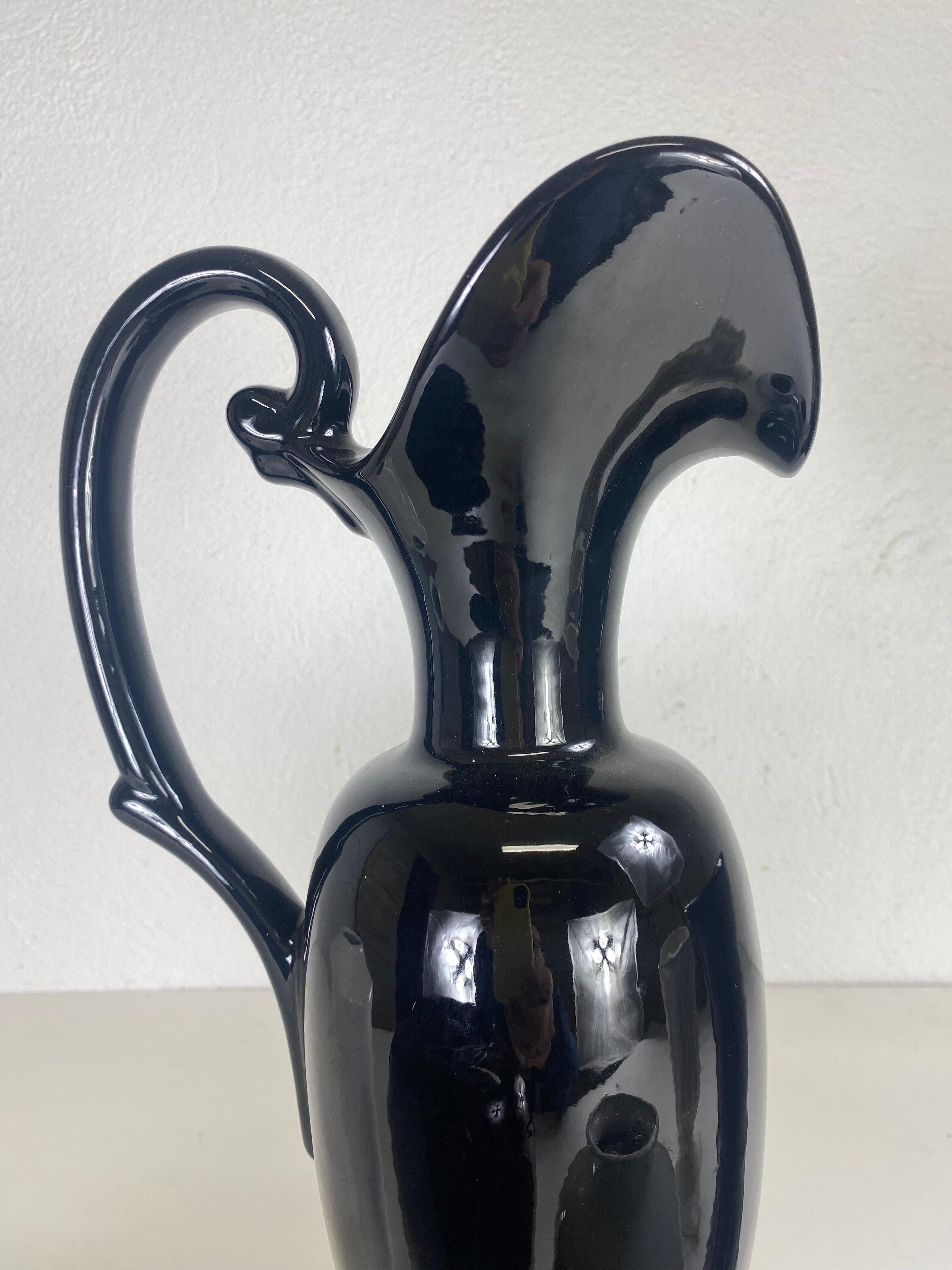 Mid-Century Modern Mid century complementary grouping of black and white pottery vases. For Sale