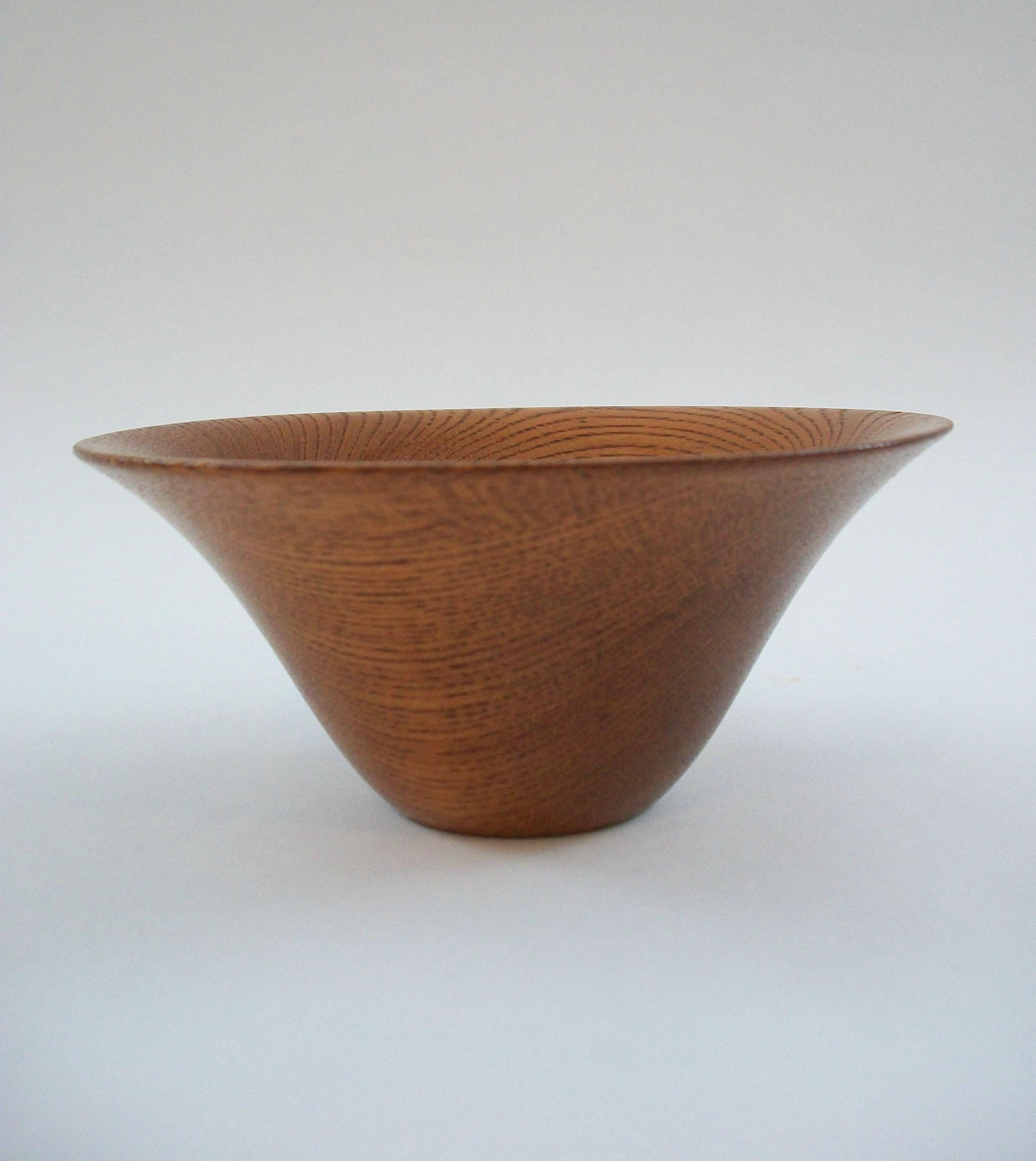 Mid Century Danish teak conical bowl - small size - featuring an elegant modern design - varnished finish - signed on the base (unidentified maker) - Denmark - circa 1960's.

Excellent vintage condition - minor scuffs - no loss - no damage - no