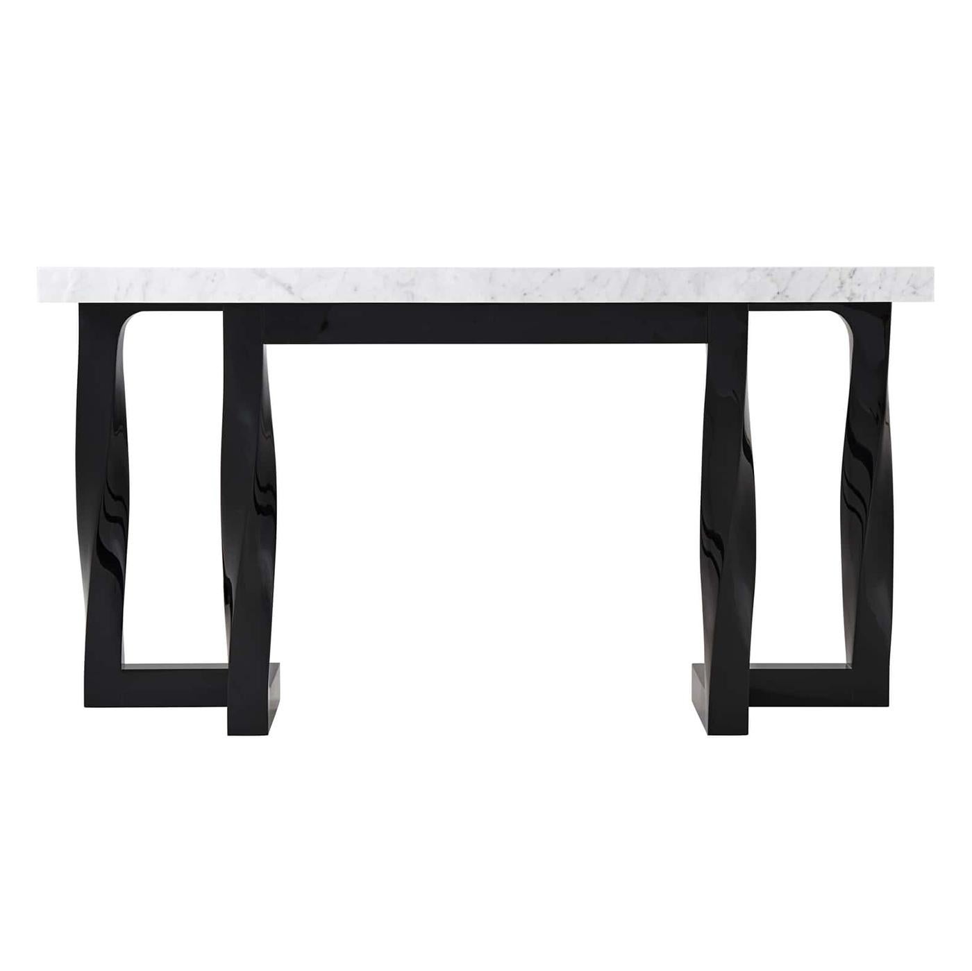 A Mid-Century Modern style console table with a thick Bianco Carrara marble top on a black lacquered composite base with twisted column supports. 
Dimensions: 64