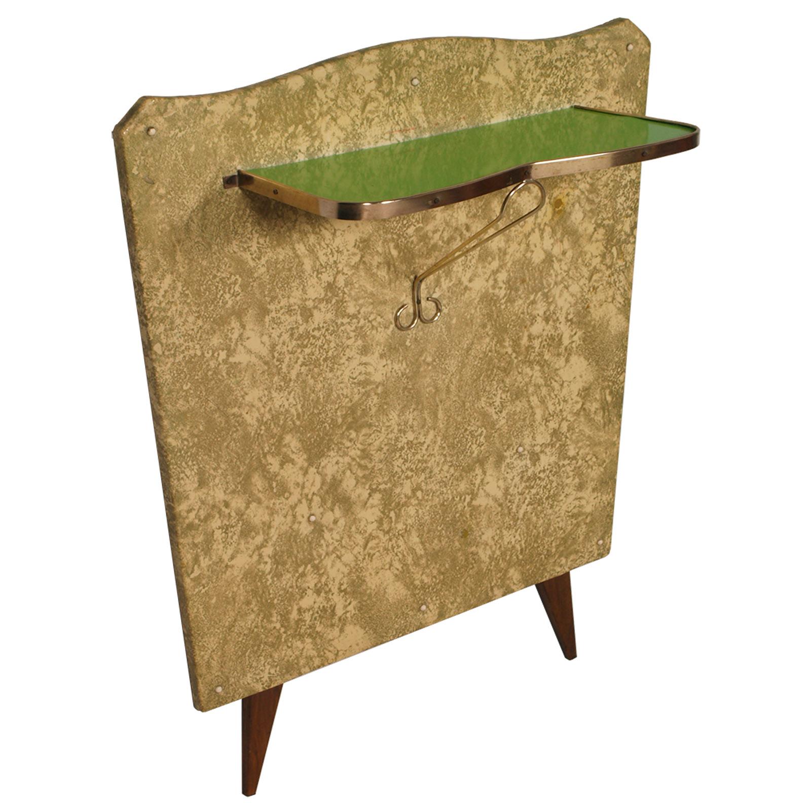 1950s console in gilded brass and plasticized fabric by Brugnoli Mobili Cantù, Pier Luigi Colli manner, green lacquered glass top. Simple and elegant essential design.