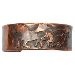 Mid Century Copper Anodized Bangle with a Horses Design