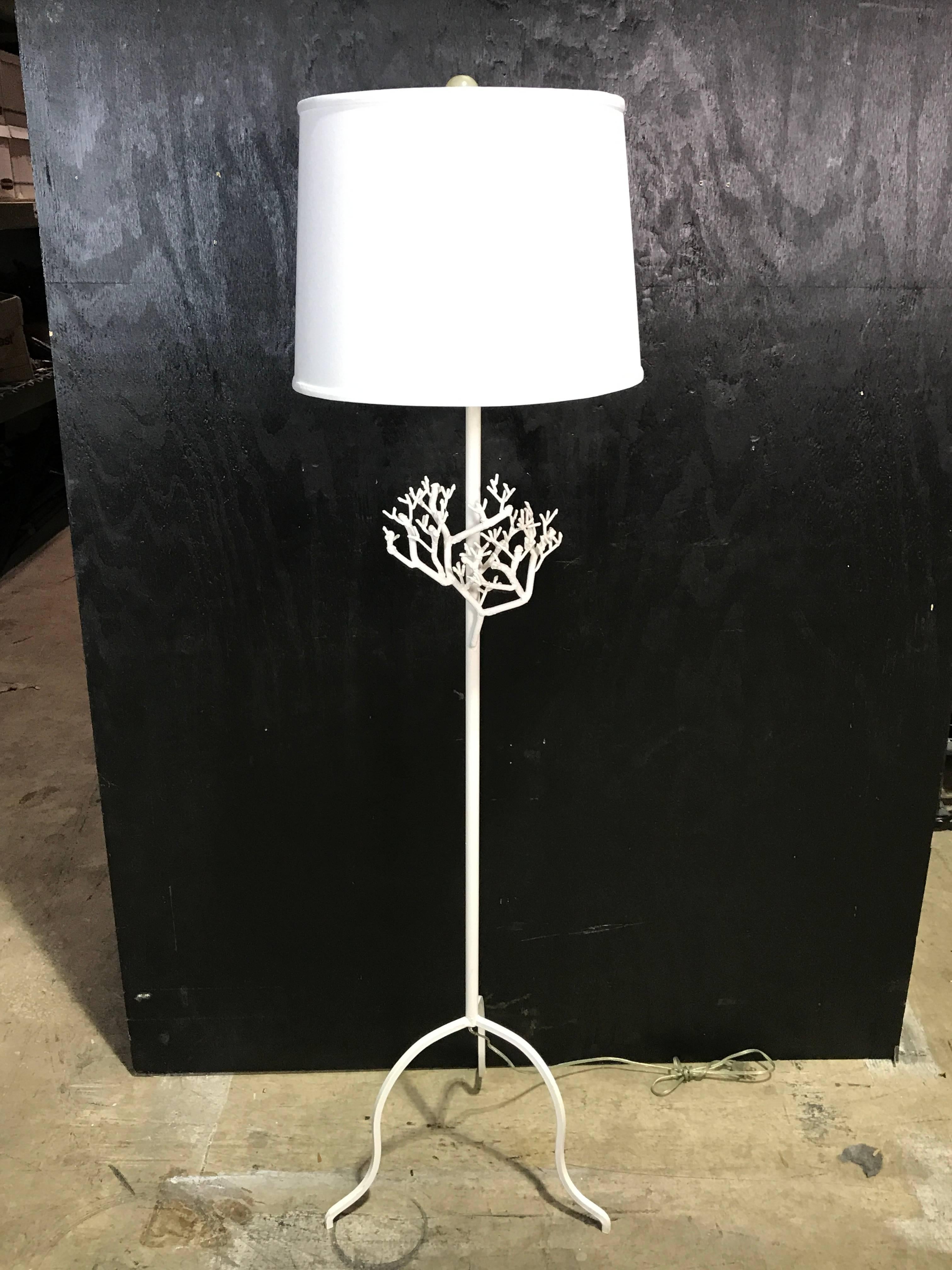 Midcentury coral motif wrought iron floor lamp in white
The floor lamp stands 47