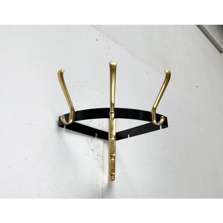 Appendiabiti angolare di metà secolo in metallo, anni '60, in ottime condizioni. Progettato dal 1960 al 1969.

Informazioni aggiuntive:
Materiali: Metallo
Colore: nero
Stili: Medioevo Moderno
Tipo di articolo: Vintage, Antico o Pre-owned
Dimensioni: